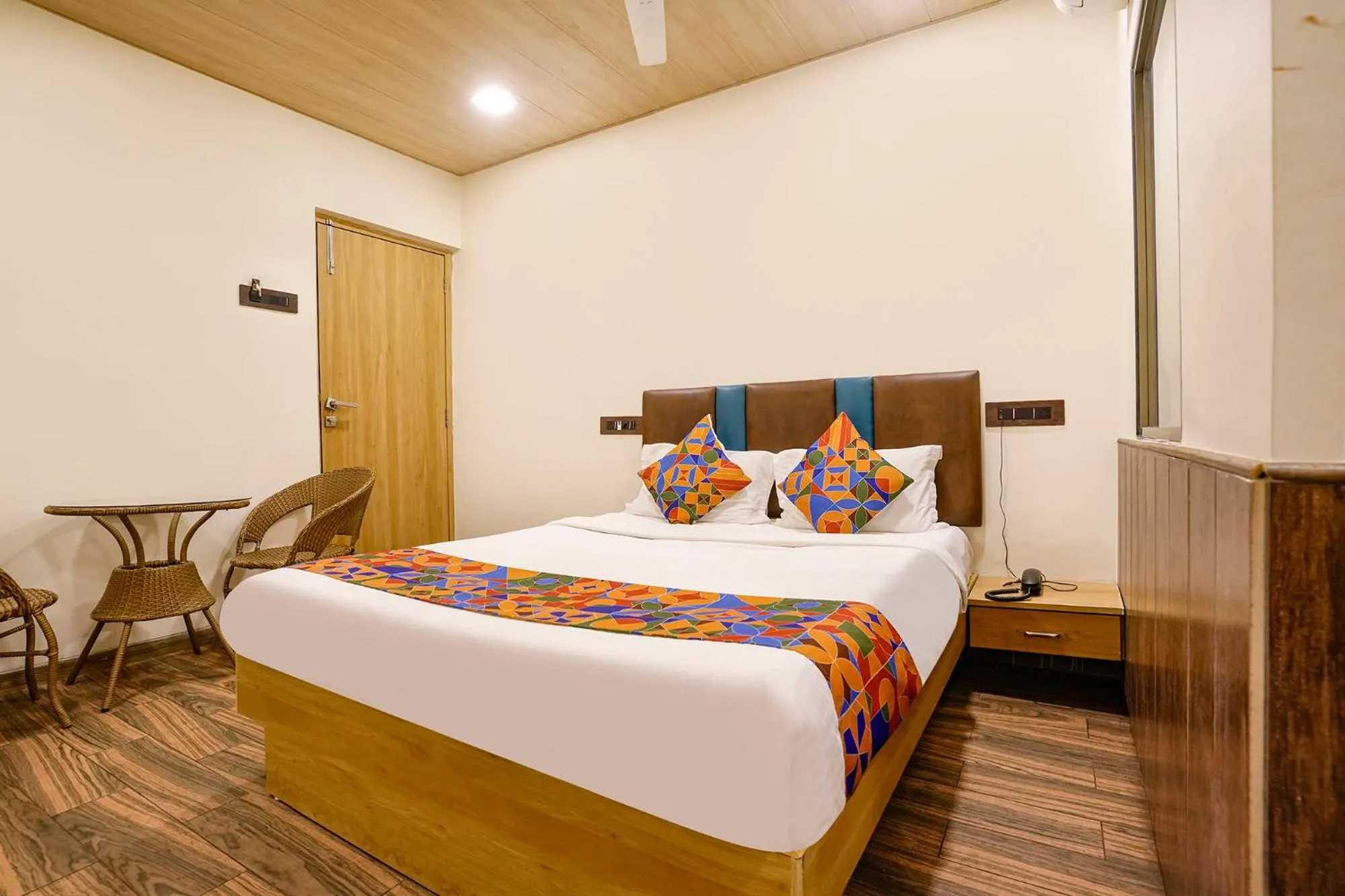Bed in FabHotel Malali Residency
