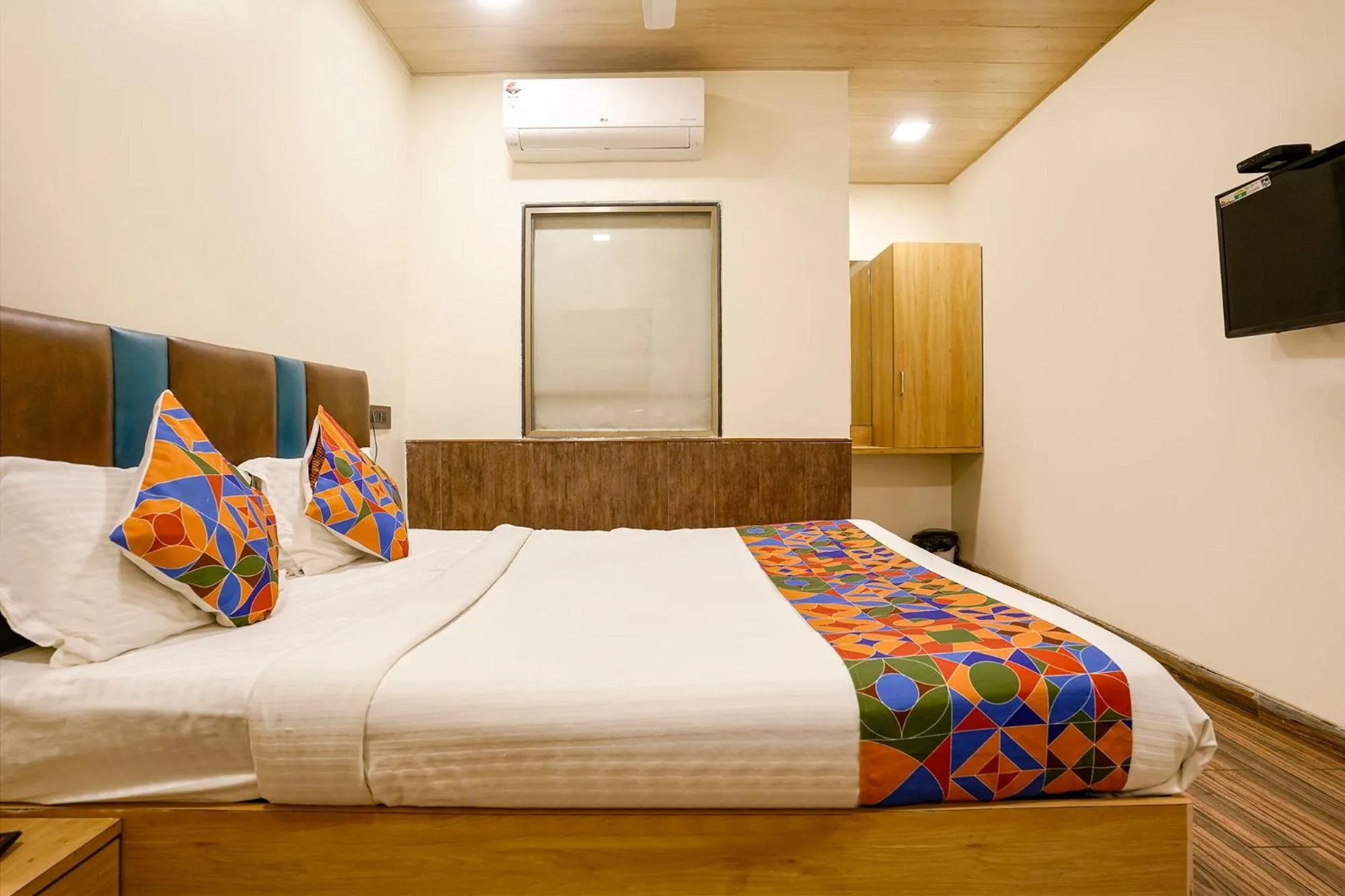 Bed in FabHotel Malali Residency