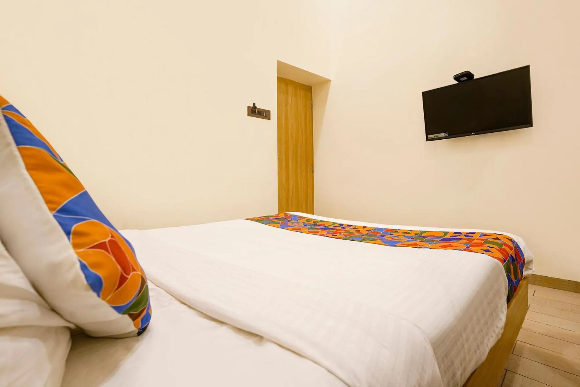 Bed in FabHotel Malali Residency