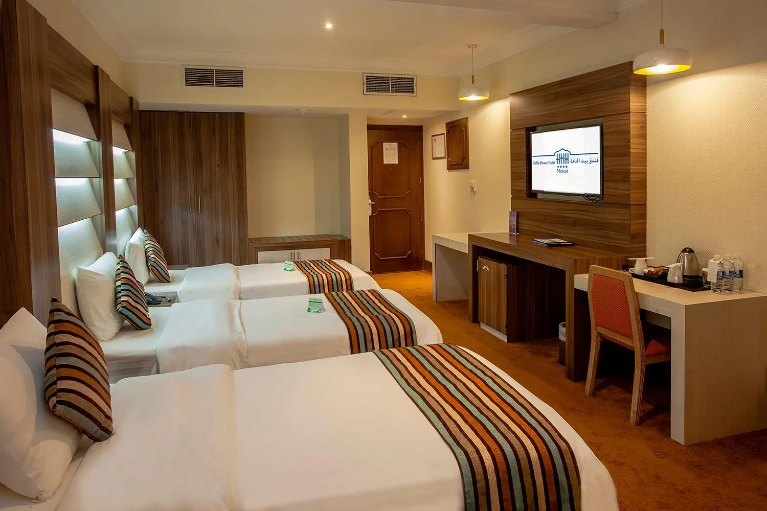 Bed in HAFFA HOUSE HOTEL