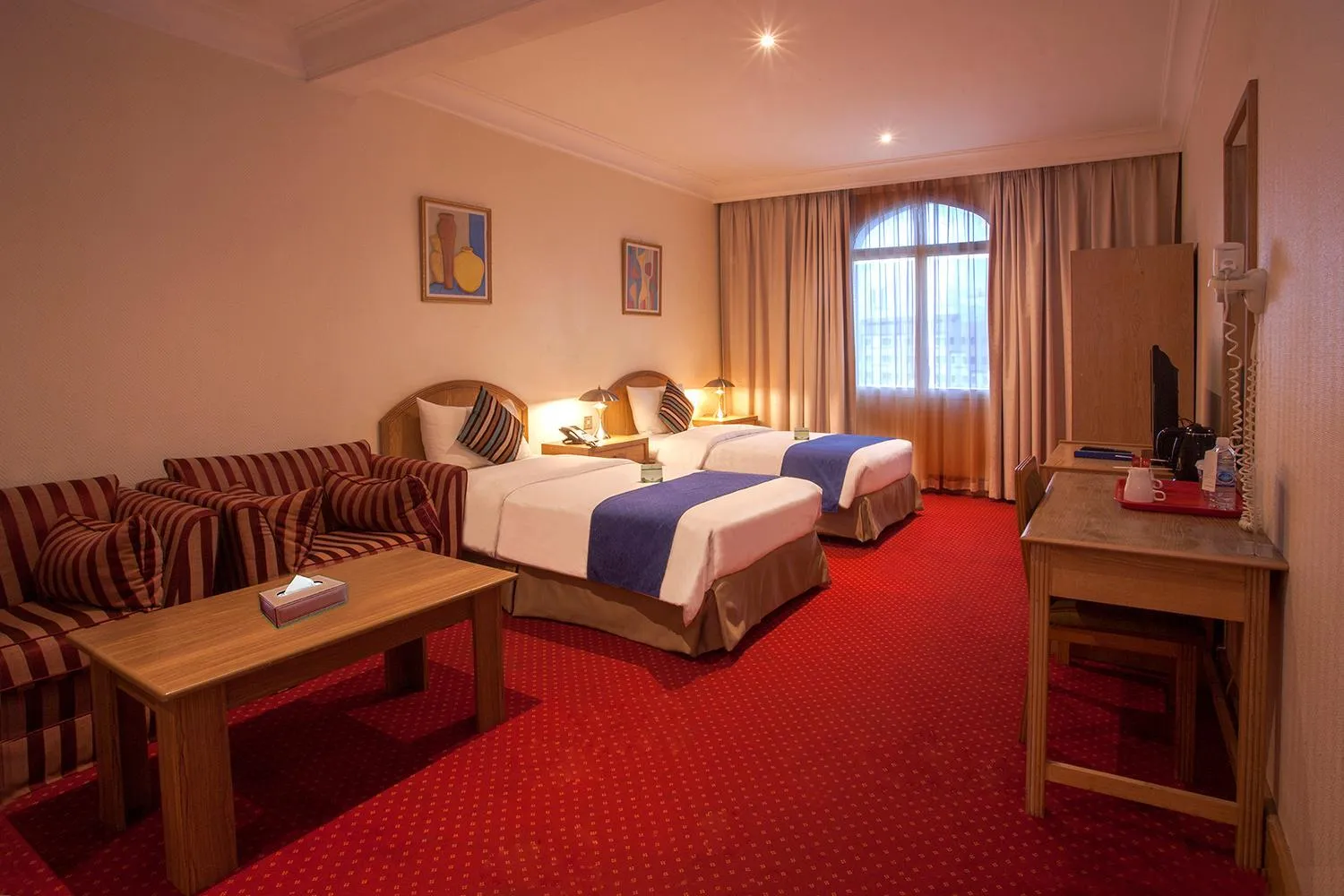 Bed in HAFFA HOUSE HOTEL