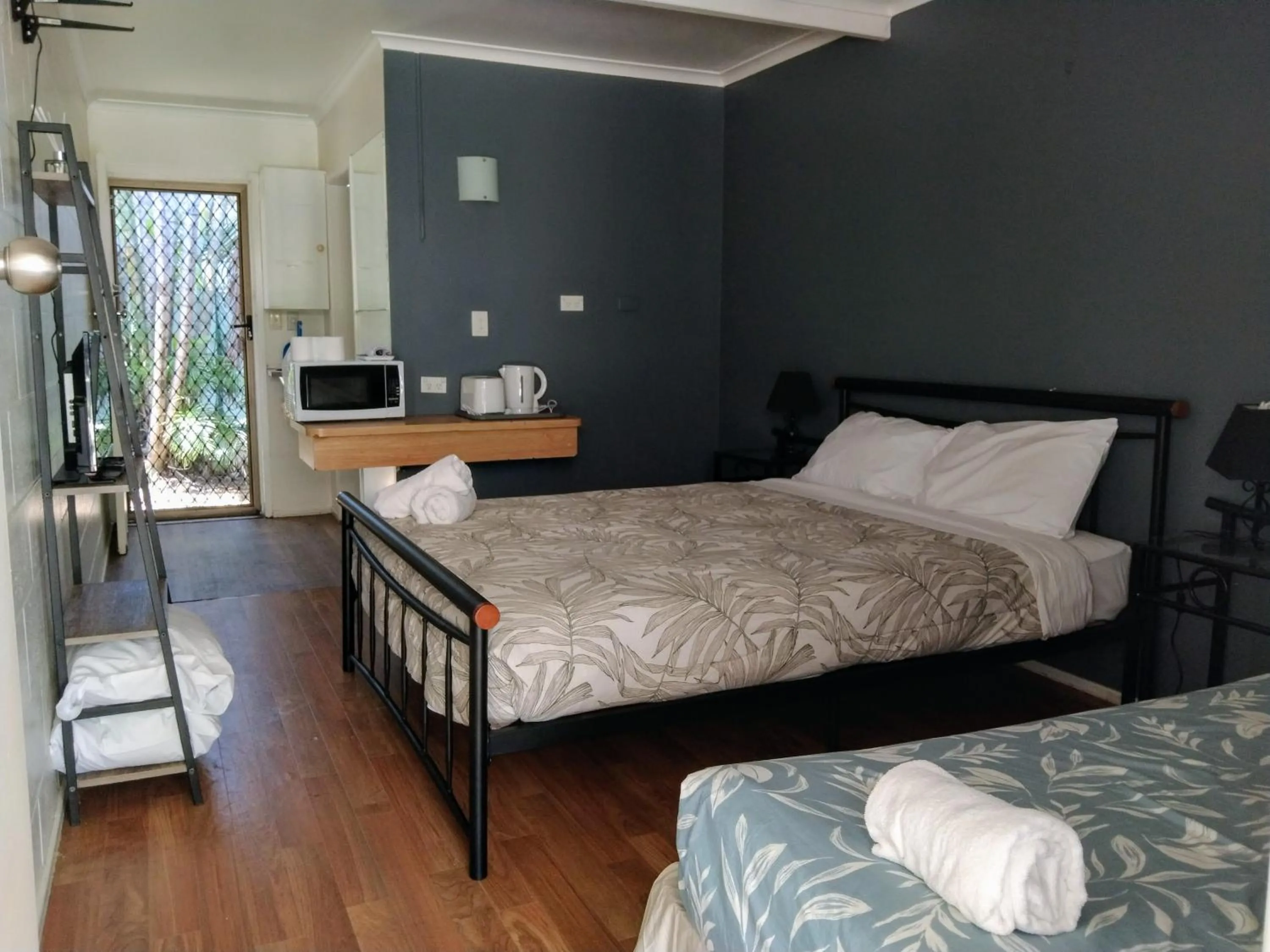 Bed in Bargara Beach Motor Inn budget accommodation pet friendly on application
