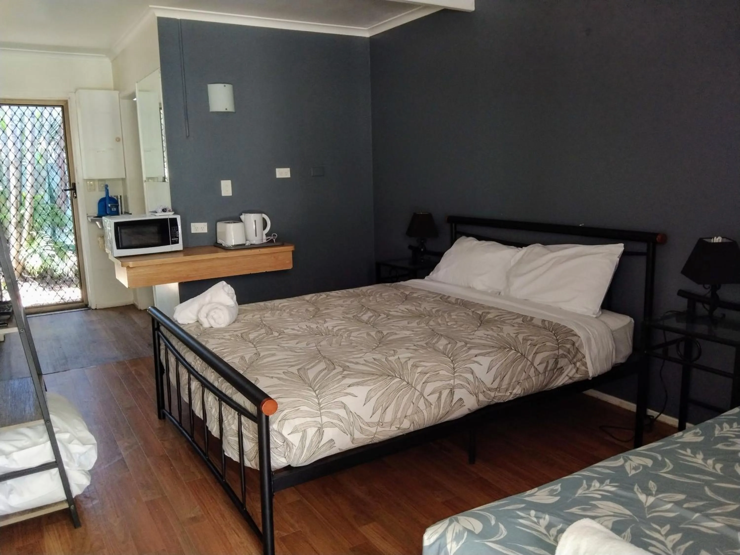 Bed in Bargara Beach Motor Inn budget accommodation pet friendly on application