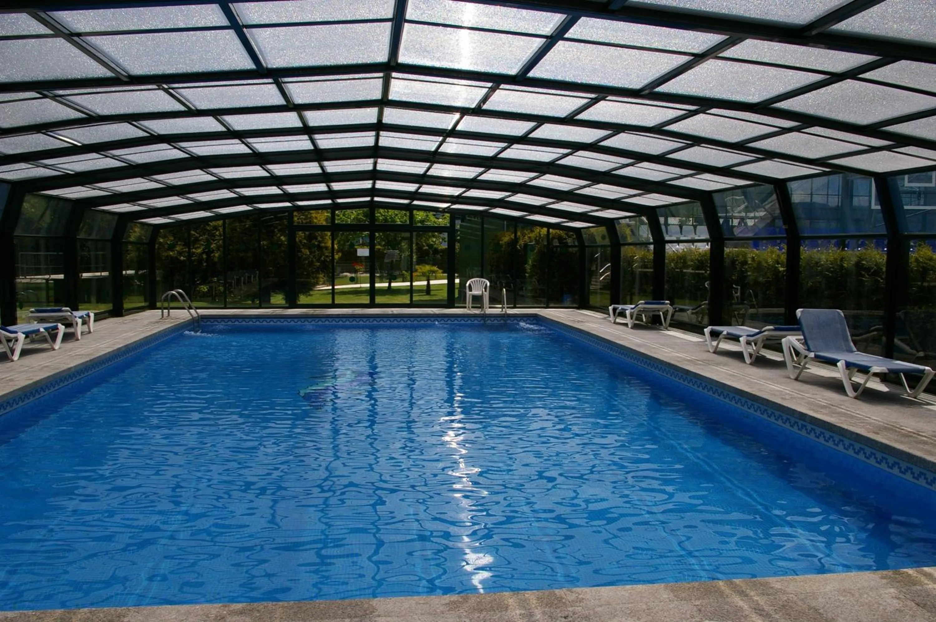 Swimming pool in Hotel Auditorio Santiago & Spa