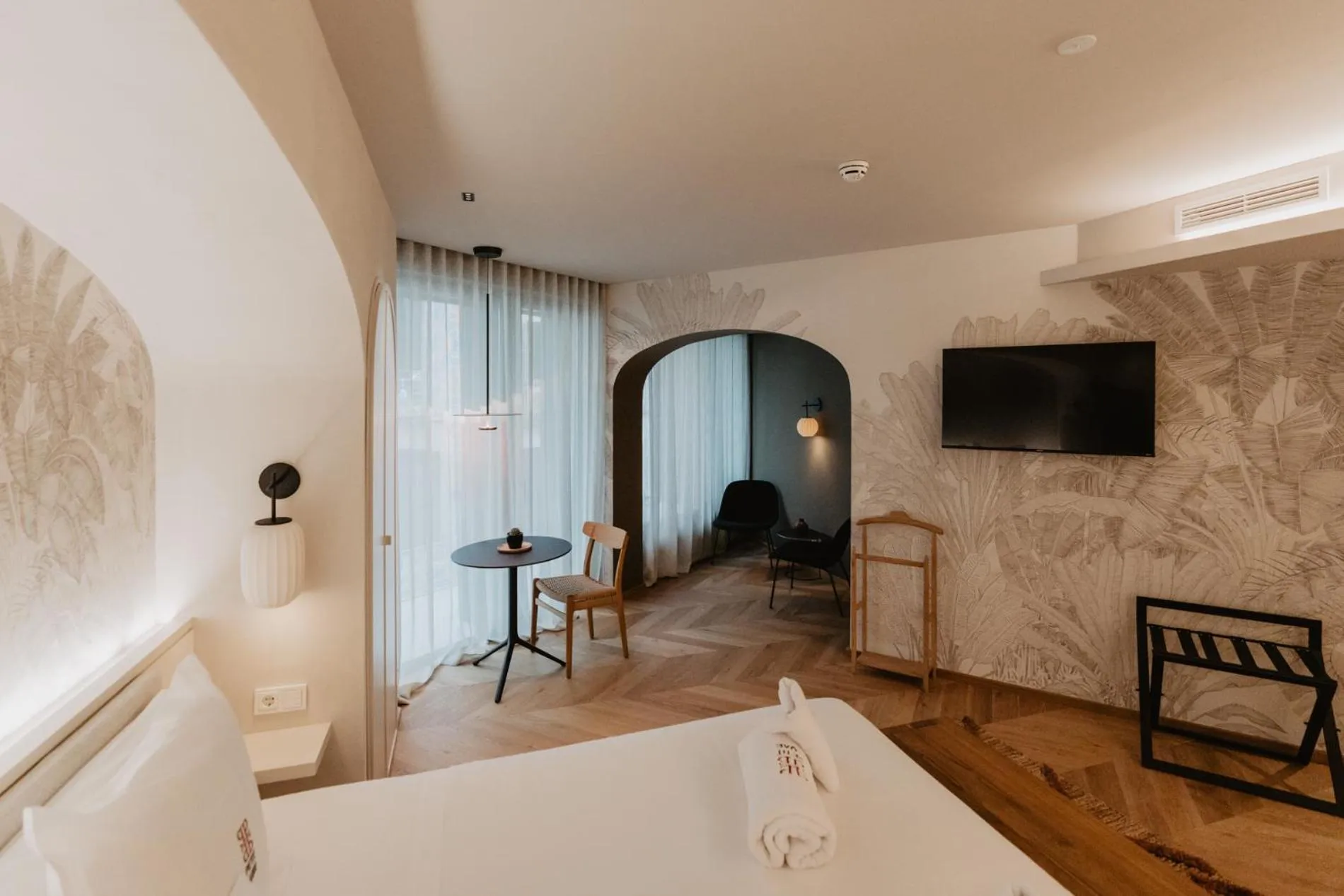 Bed in Hotel Petit Luxe