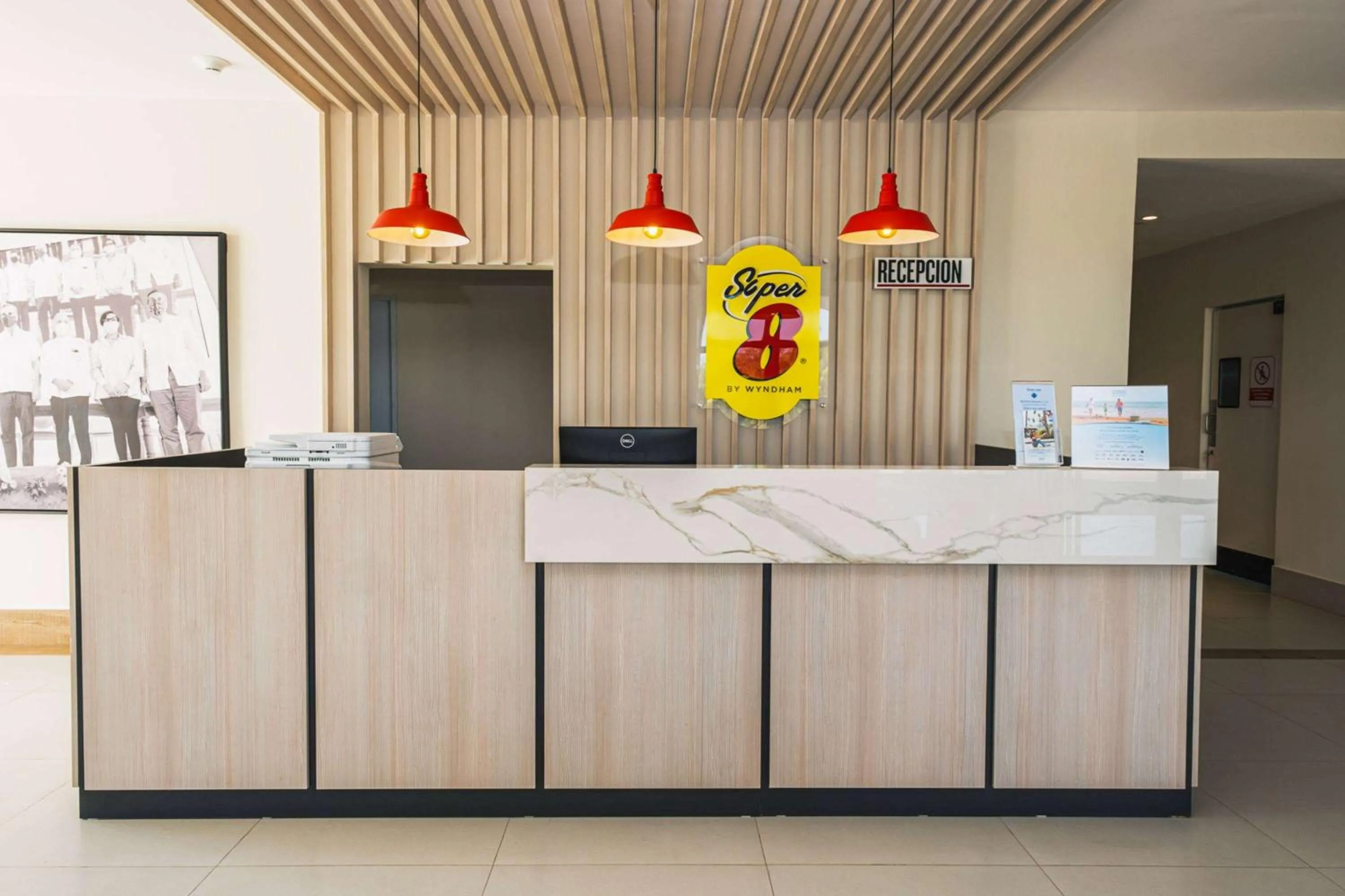 Property logo or sign in Super 8 by Wyndham Manzanillo