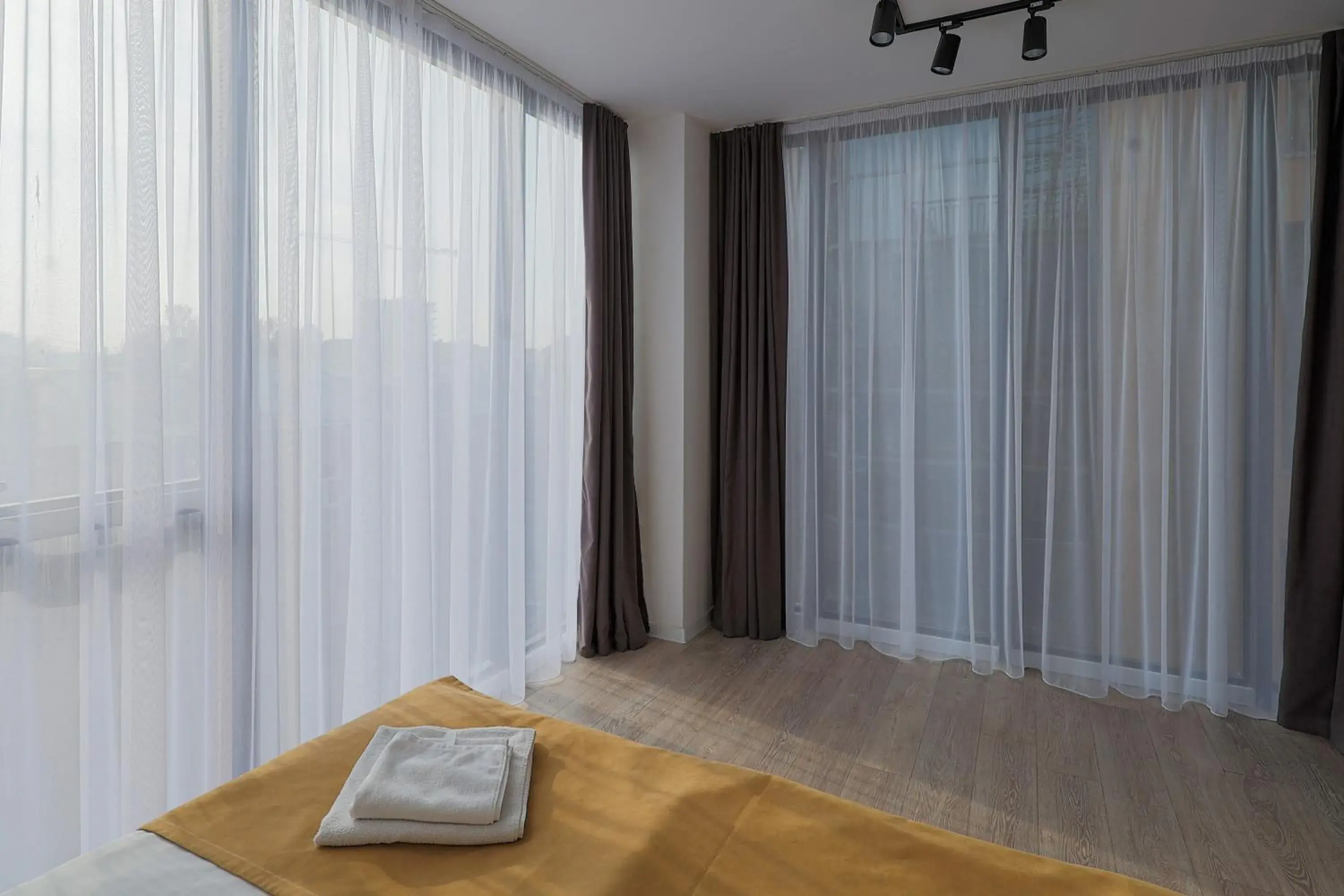 Bedroom, Bed in Welcome Republic Square Apartments Bedroom, Bed in Welcome Republic Square Apartments