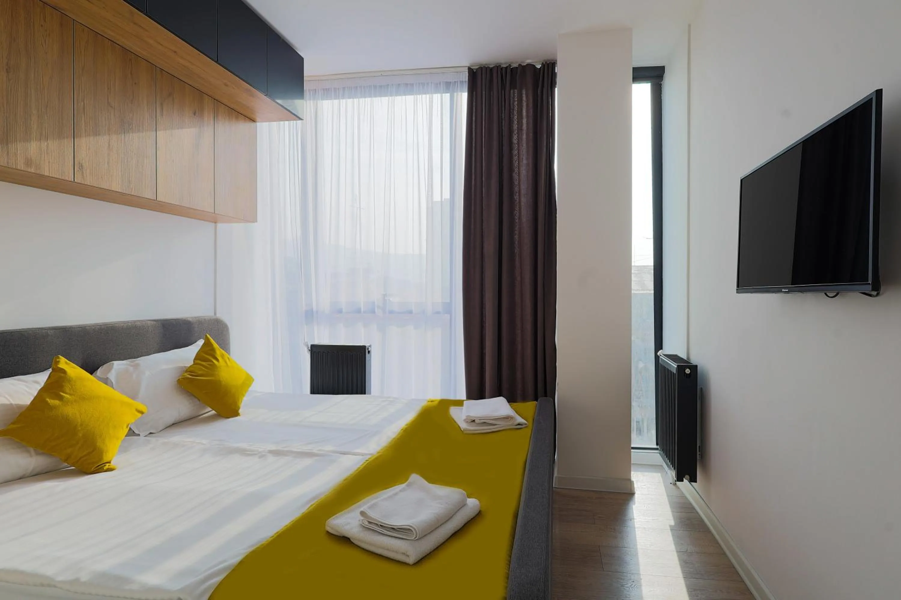 Bedroom, Bed in Welcome Republic Square Apartments