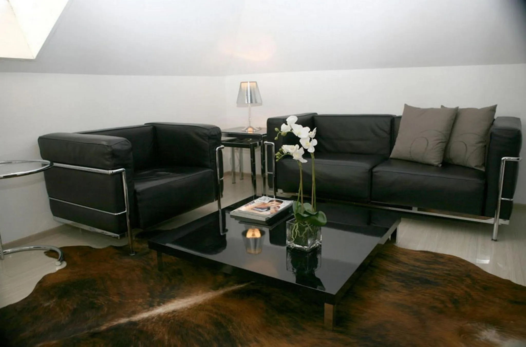 Living room in VISIONAPARTMENTS Cramerstrasse 8-12 - contactless check-in
