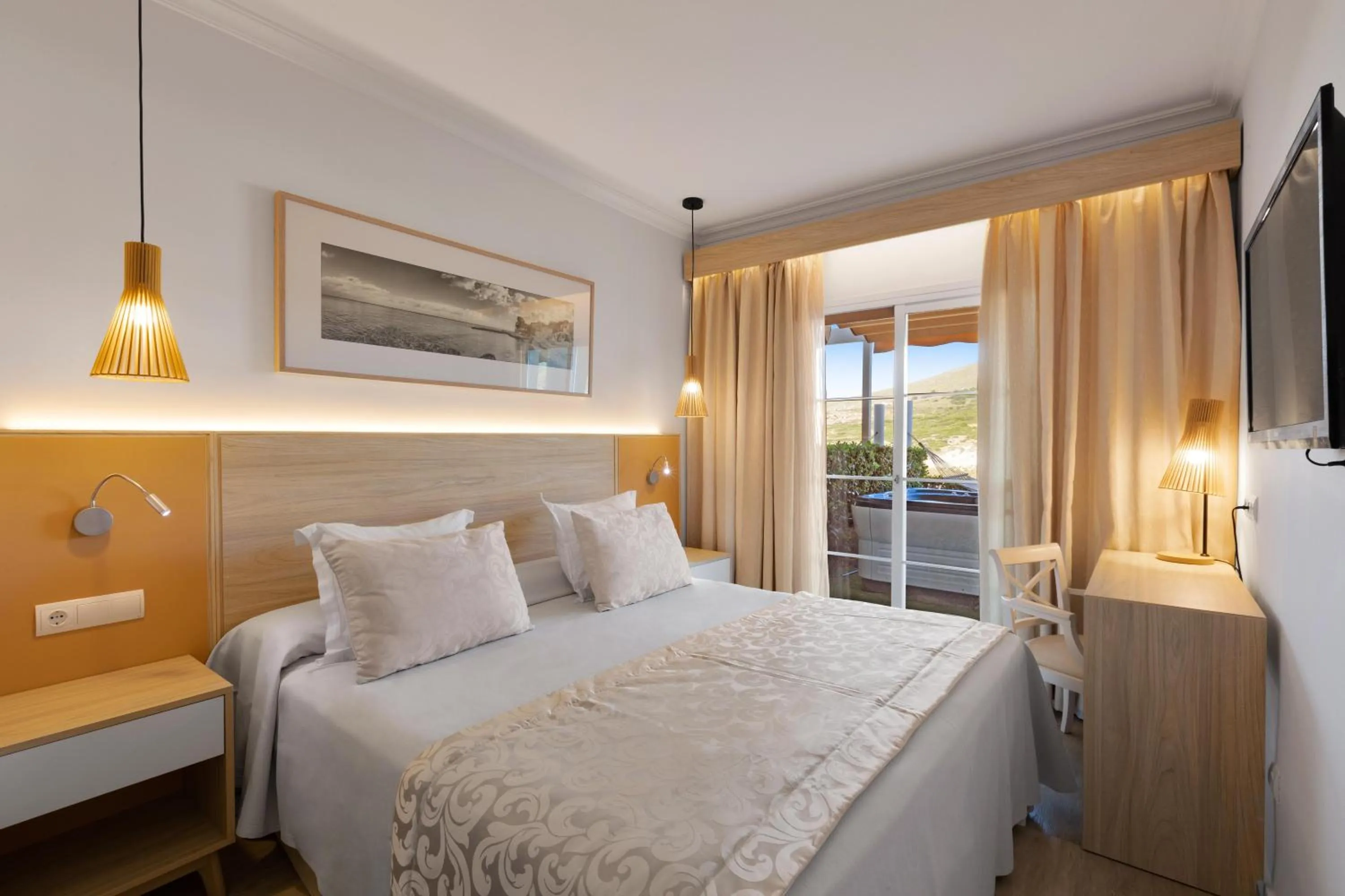 Photo of the whole room, Bed in VIVA Cala Mesquida Resort & Spa