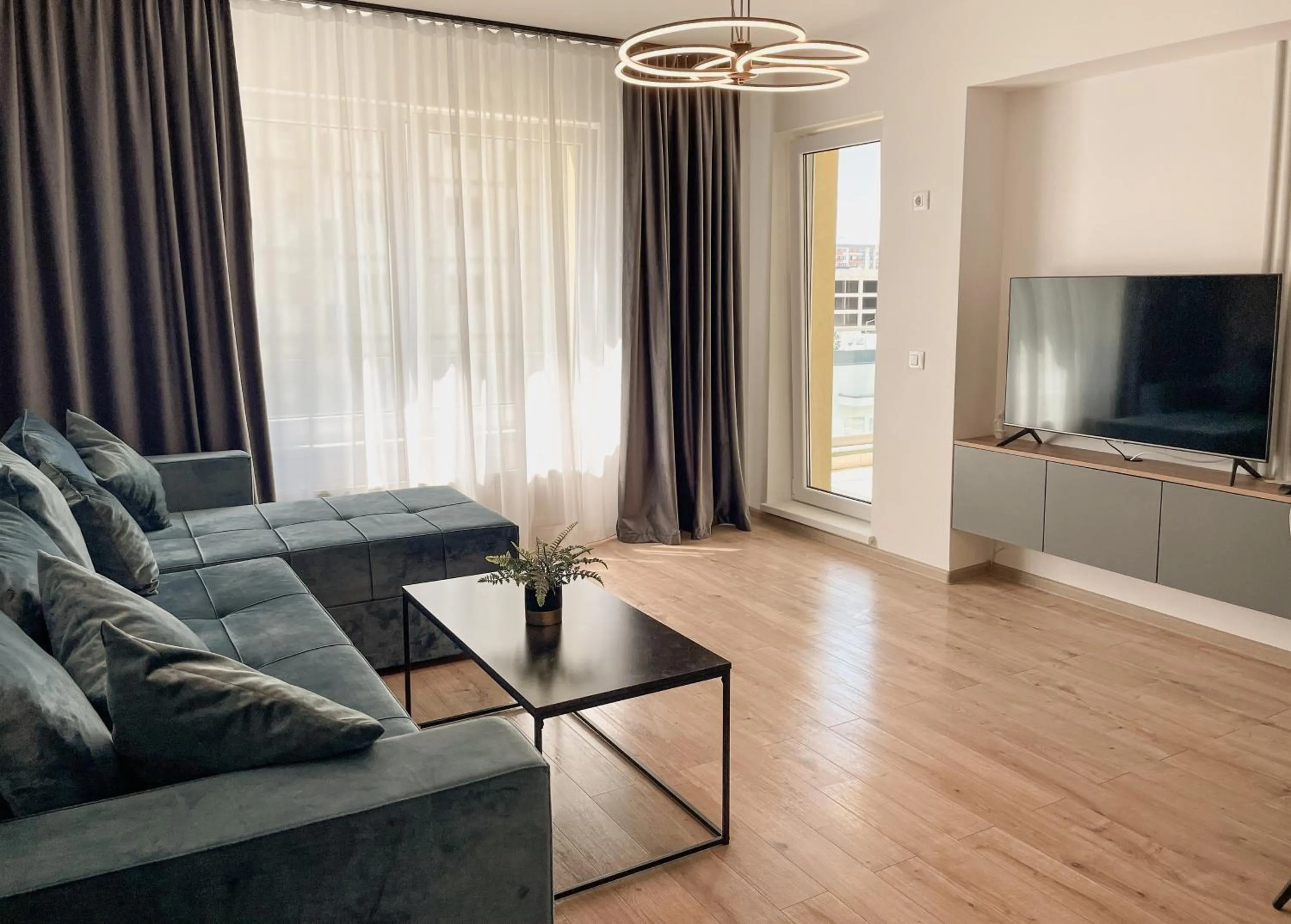TV and multimedia in MoHost Blue Moon Apartments