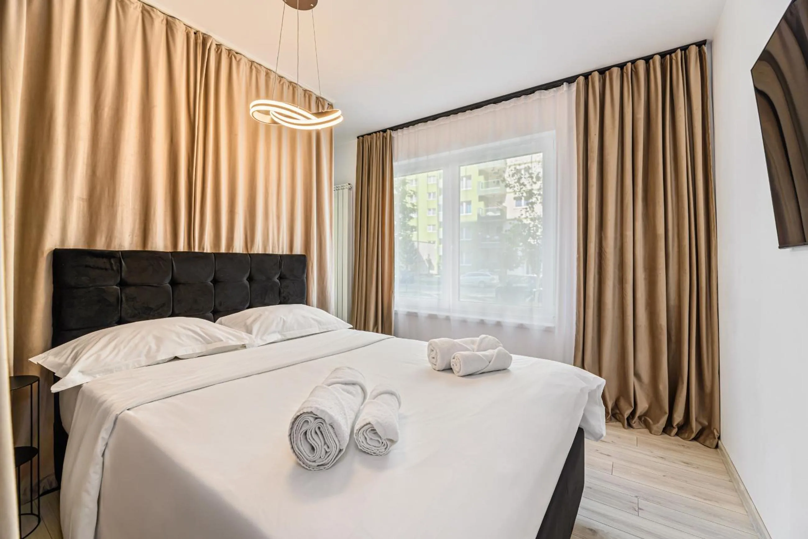 Bed in MoHost Blue Moon Apartments