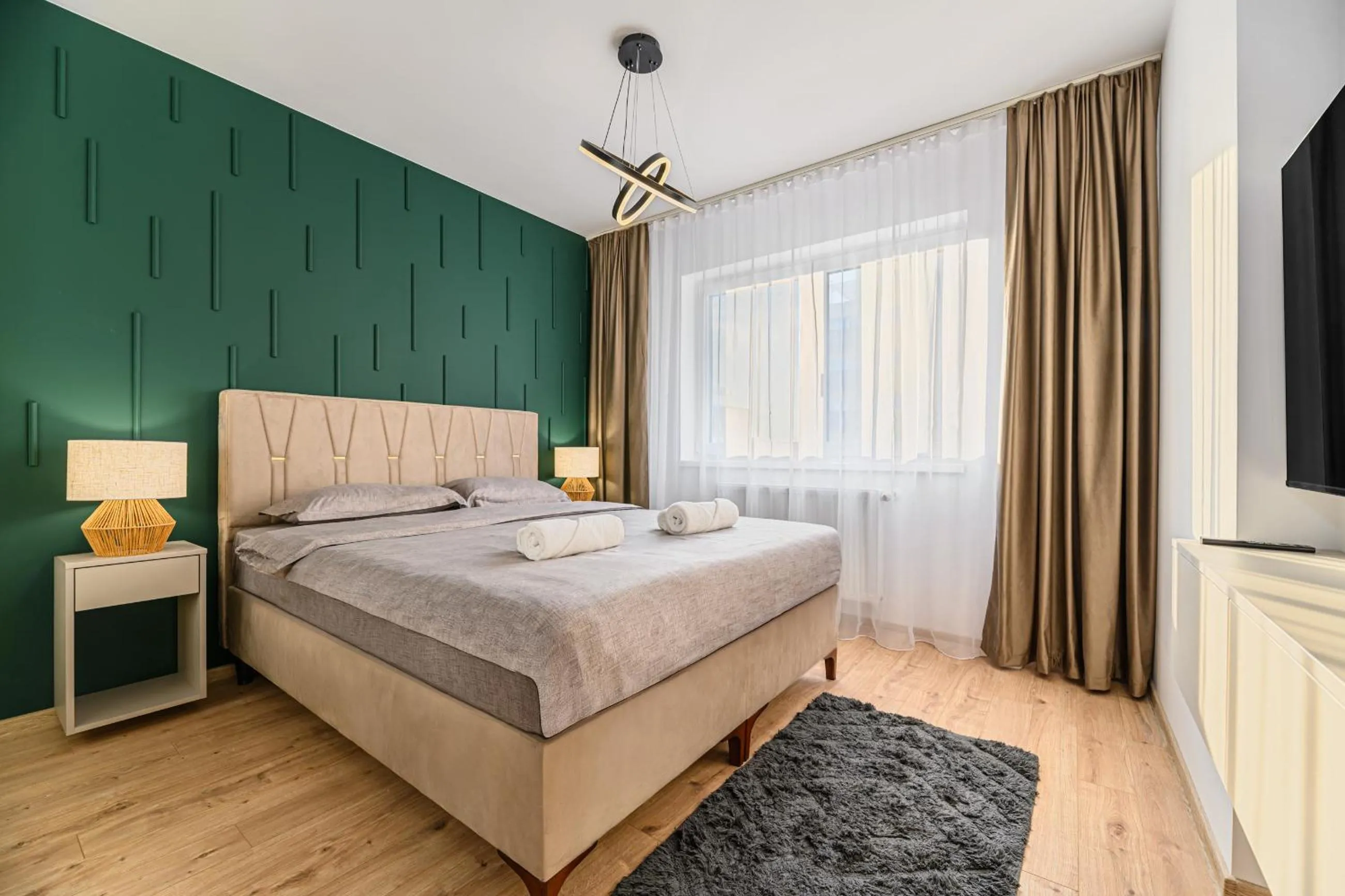TV and multimedia, Bed in MoHost Blue Moon Apartments
