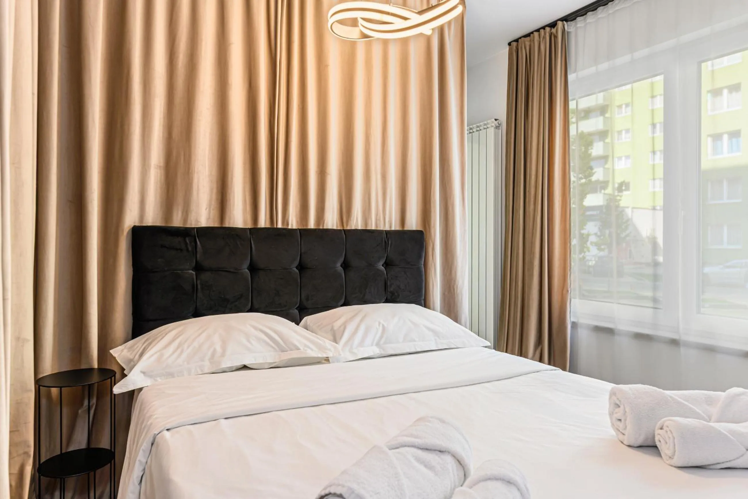 Bed in MoHost Blue Moon Apartments