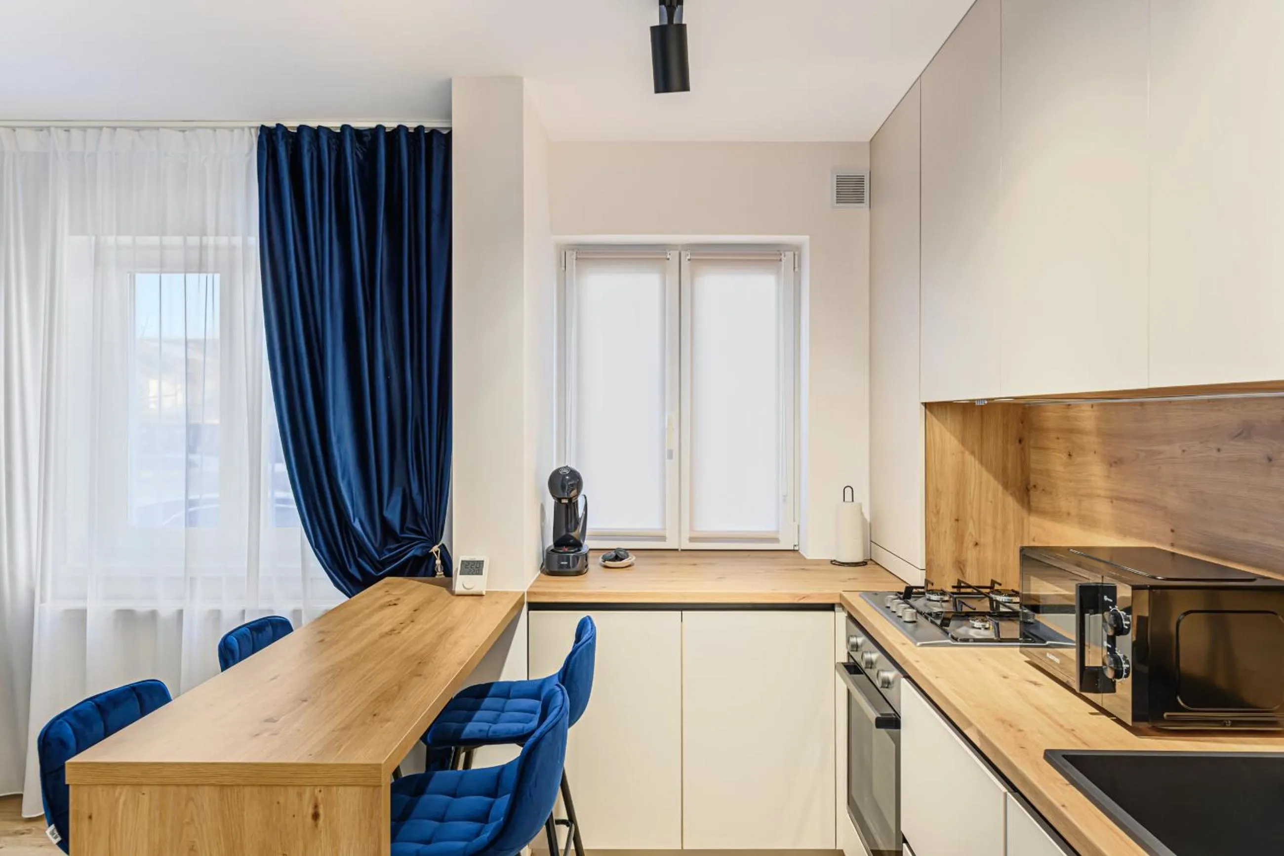 Kitchen or kitchenette in MoHost Blue Moon Apartments