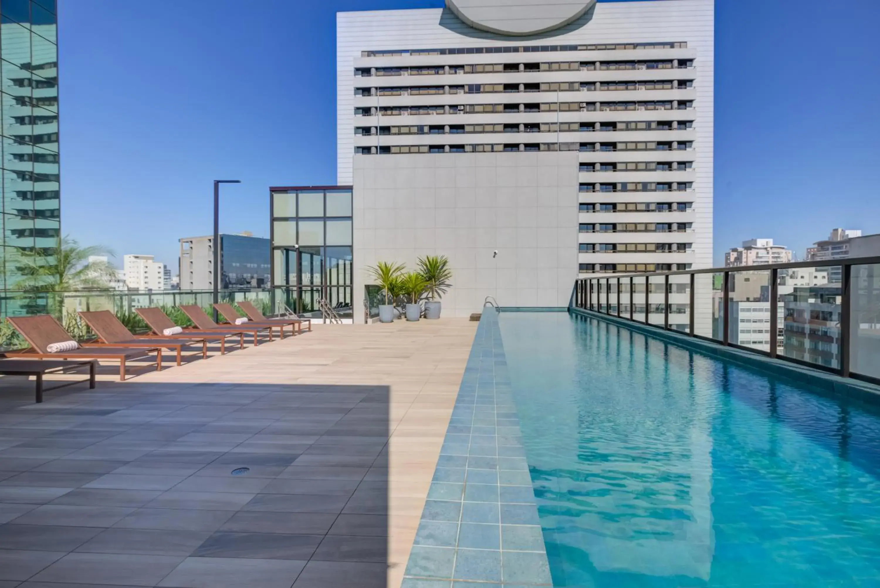 Pool view in Qoya São Paulo Paulista, Curio Collection by Hilton Pool view in Qoya São Paulo Paulista, Curio Collection by Hilton