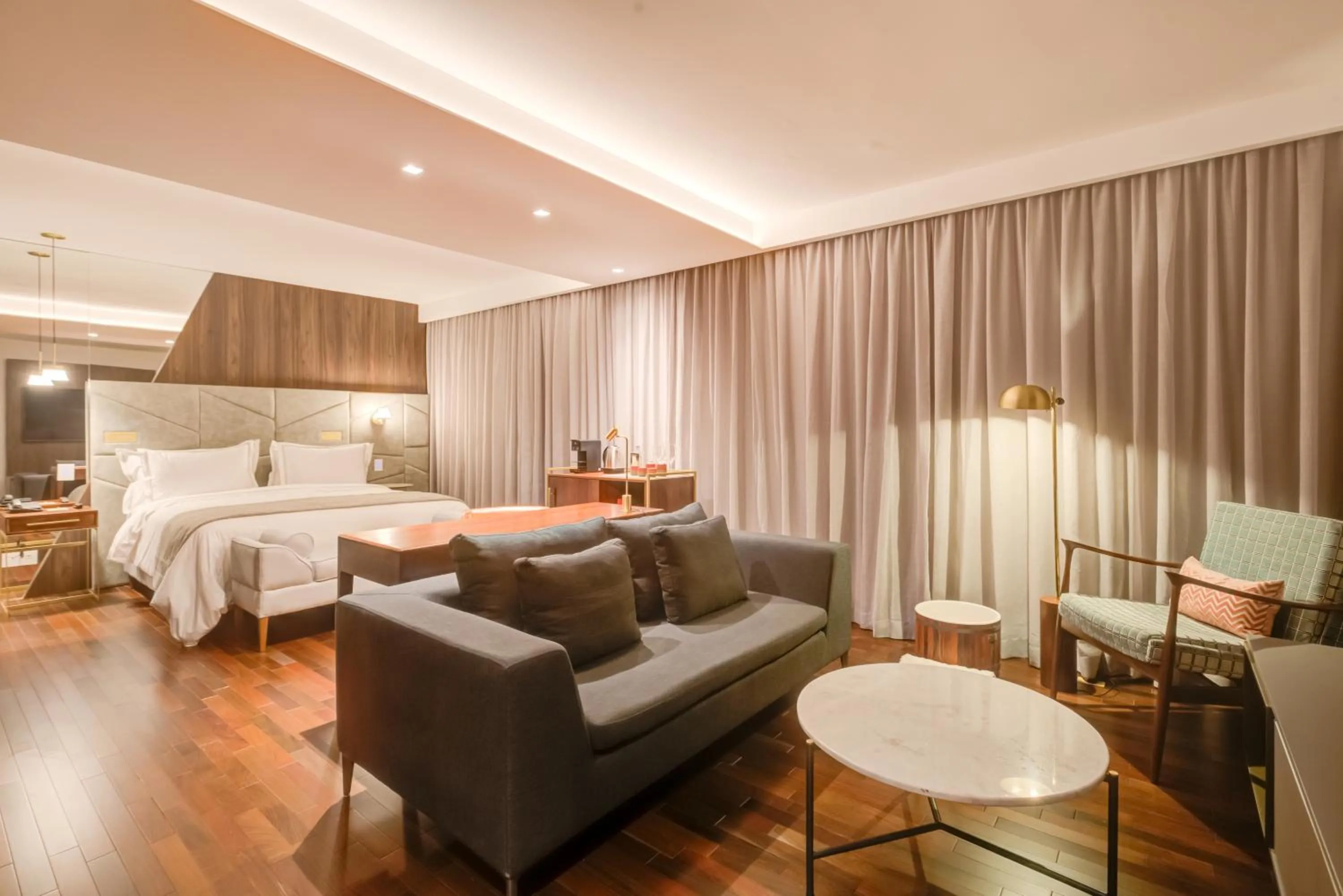 Living room, Bed in Qoya São Paulo Paulista, Curio Collection by Hilton