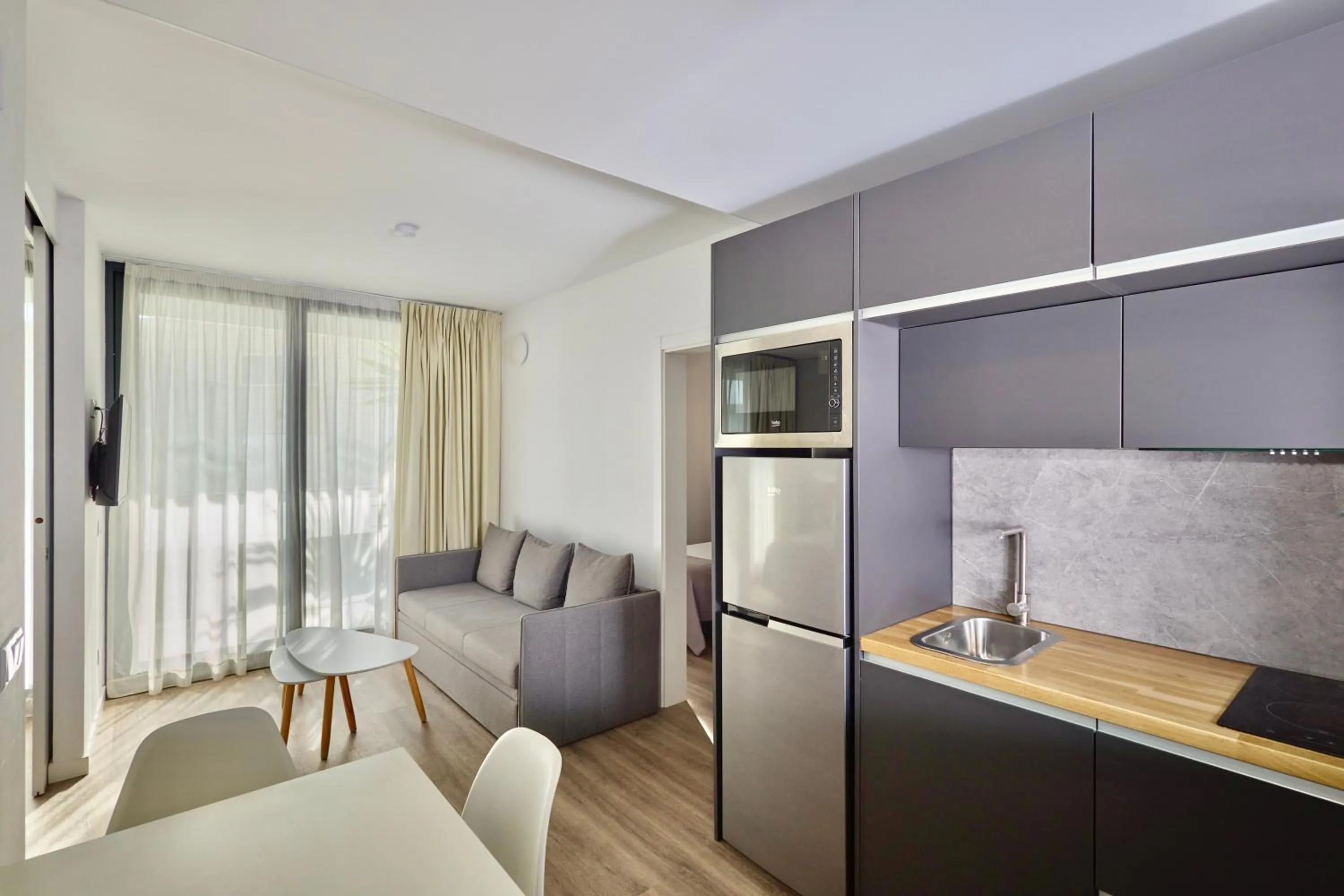 TV and multimedia in Aparthotel Comtat Sant Jordi