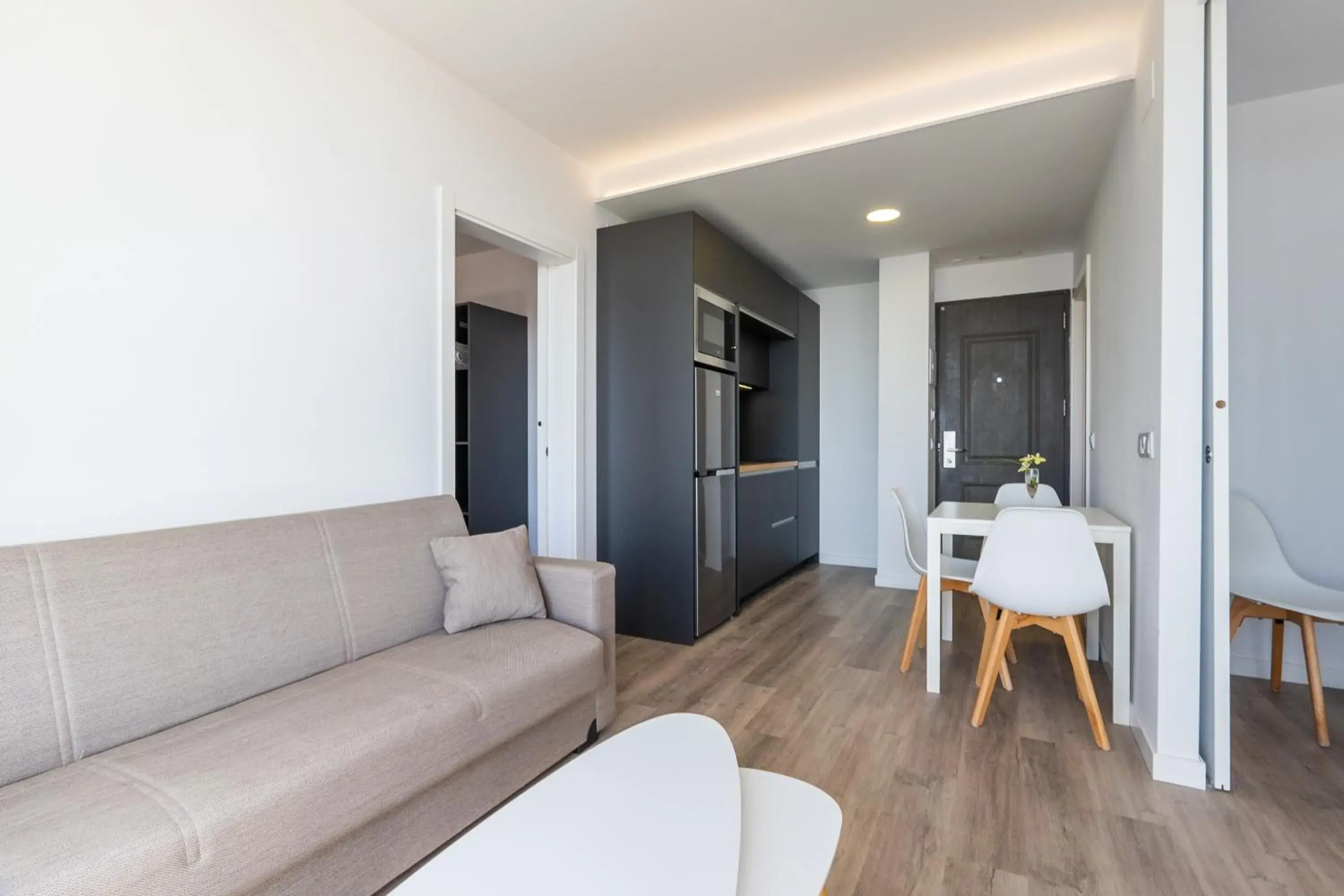 Living room in Aparthotel Comtat Sant Jordi Living room in Aparthotel Comtat Sant Jordi