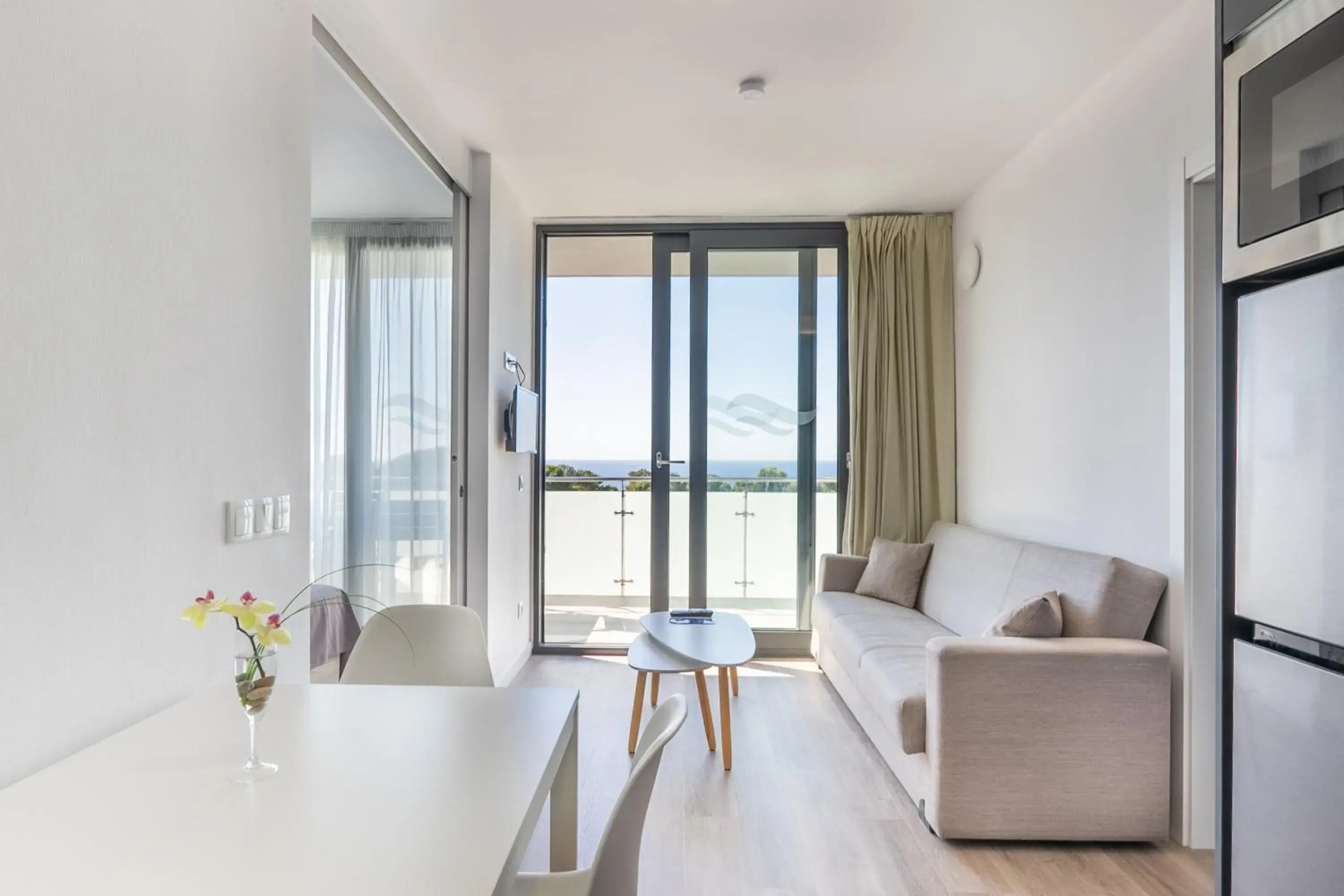 Living room in Aparthotel Comtat Sant Jordi Living room in Aparthotel Comtat Sant Jordi