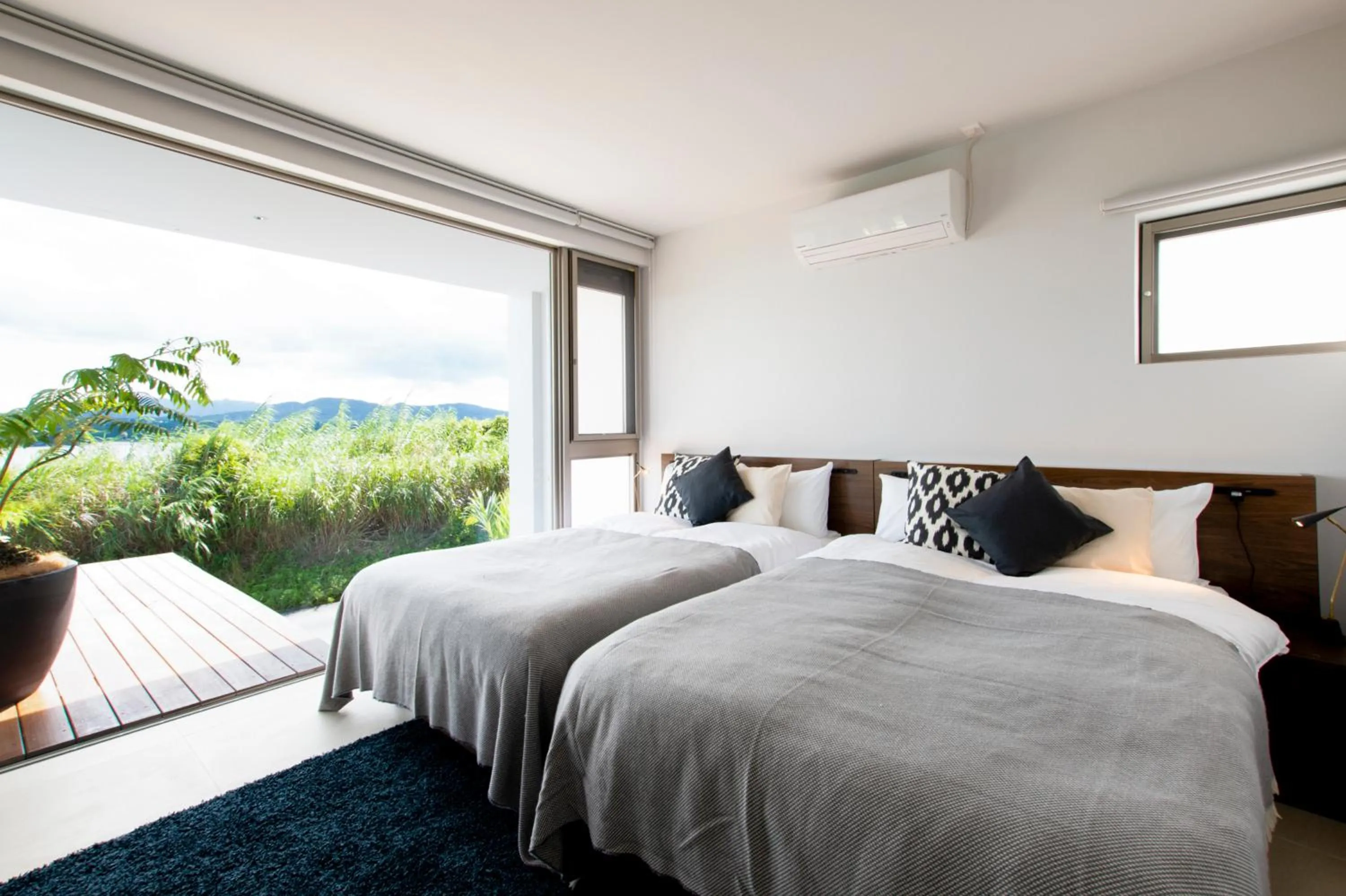 Photo of the whole room, Bed in KOURI VILLA Indigo