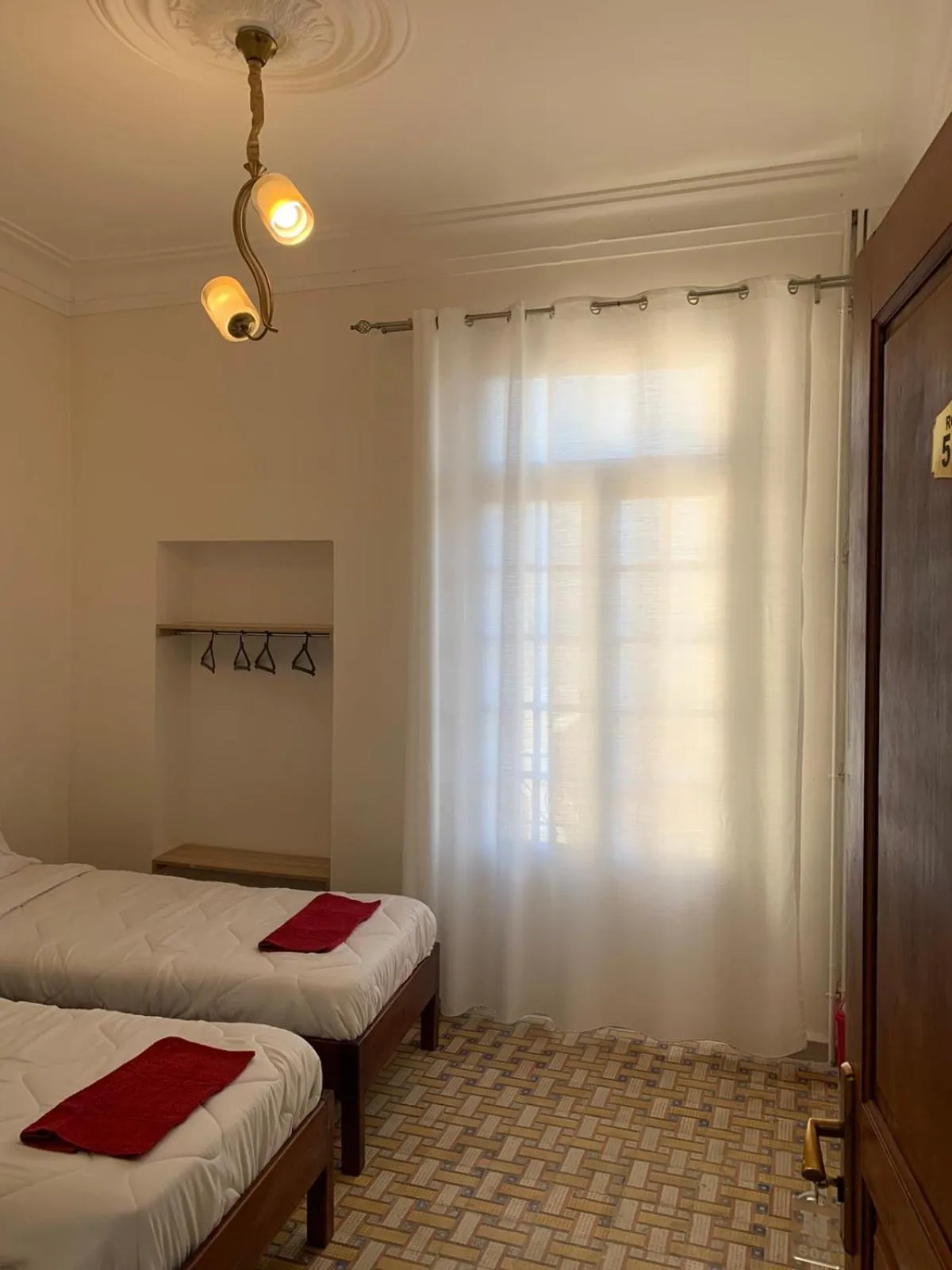 Bed in AFRIC HOTEL- Casbah