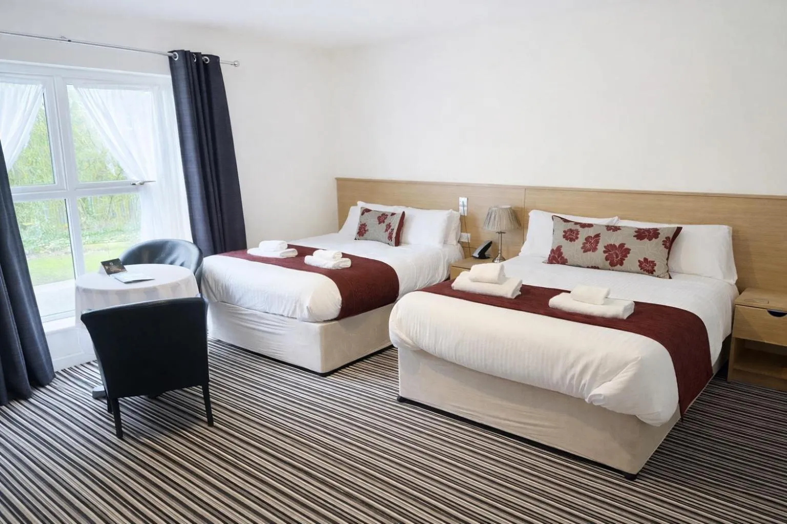 Bed in The Hedges Hotel