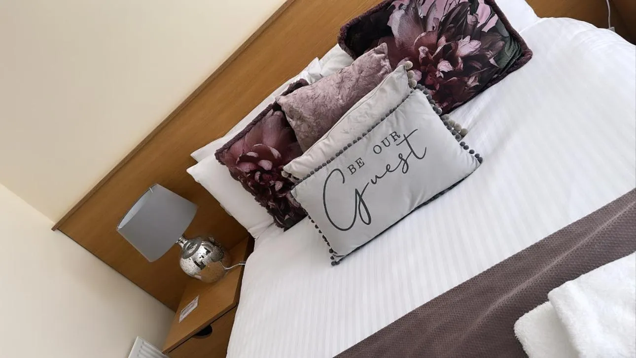 Bed in The Hedges Hotel