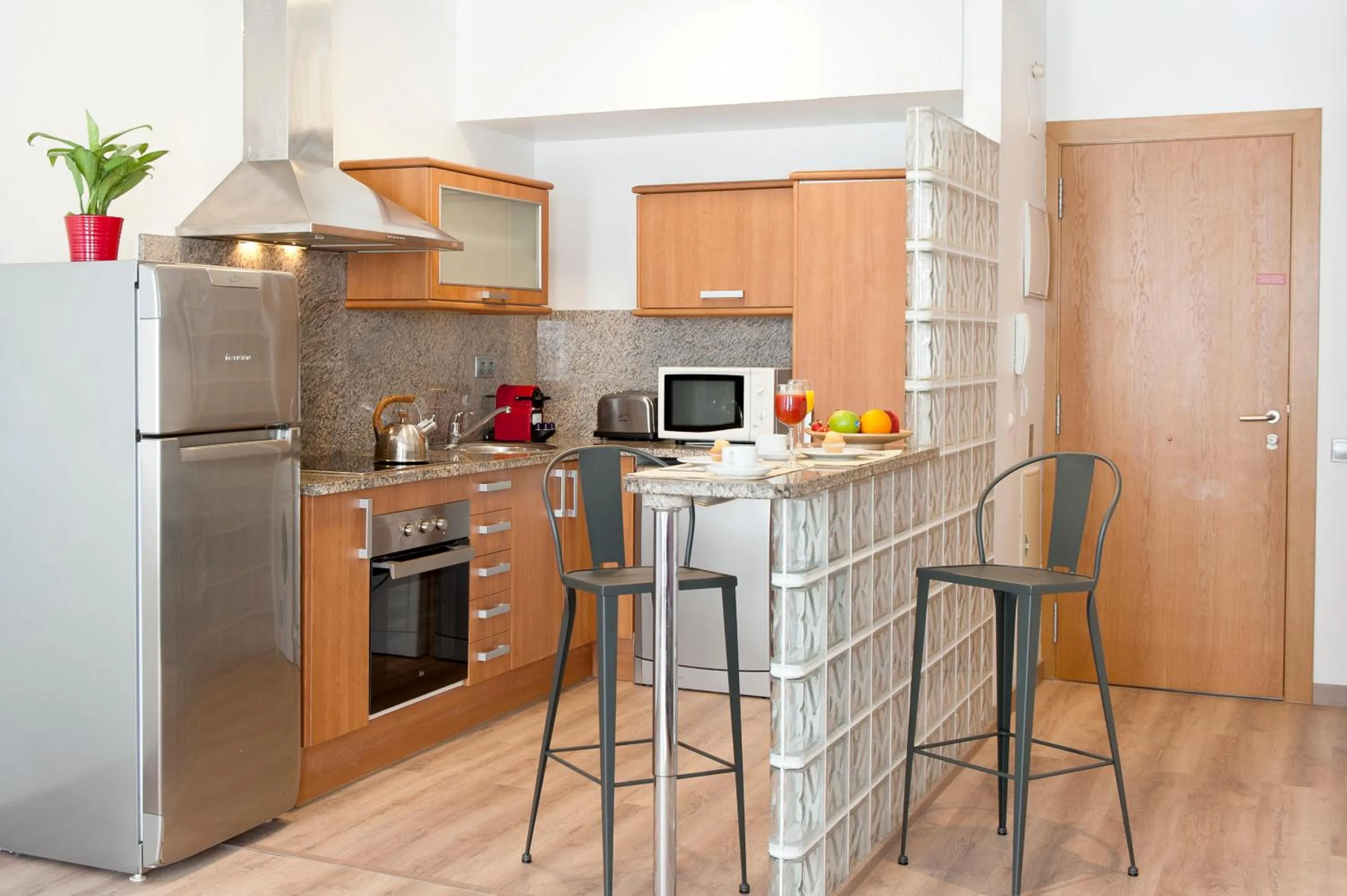 Kitchen or kitchenette in MH Apartments S. Familia
