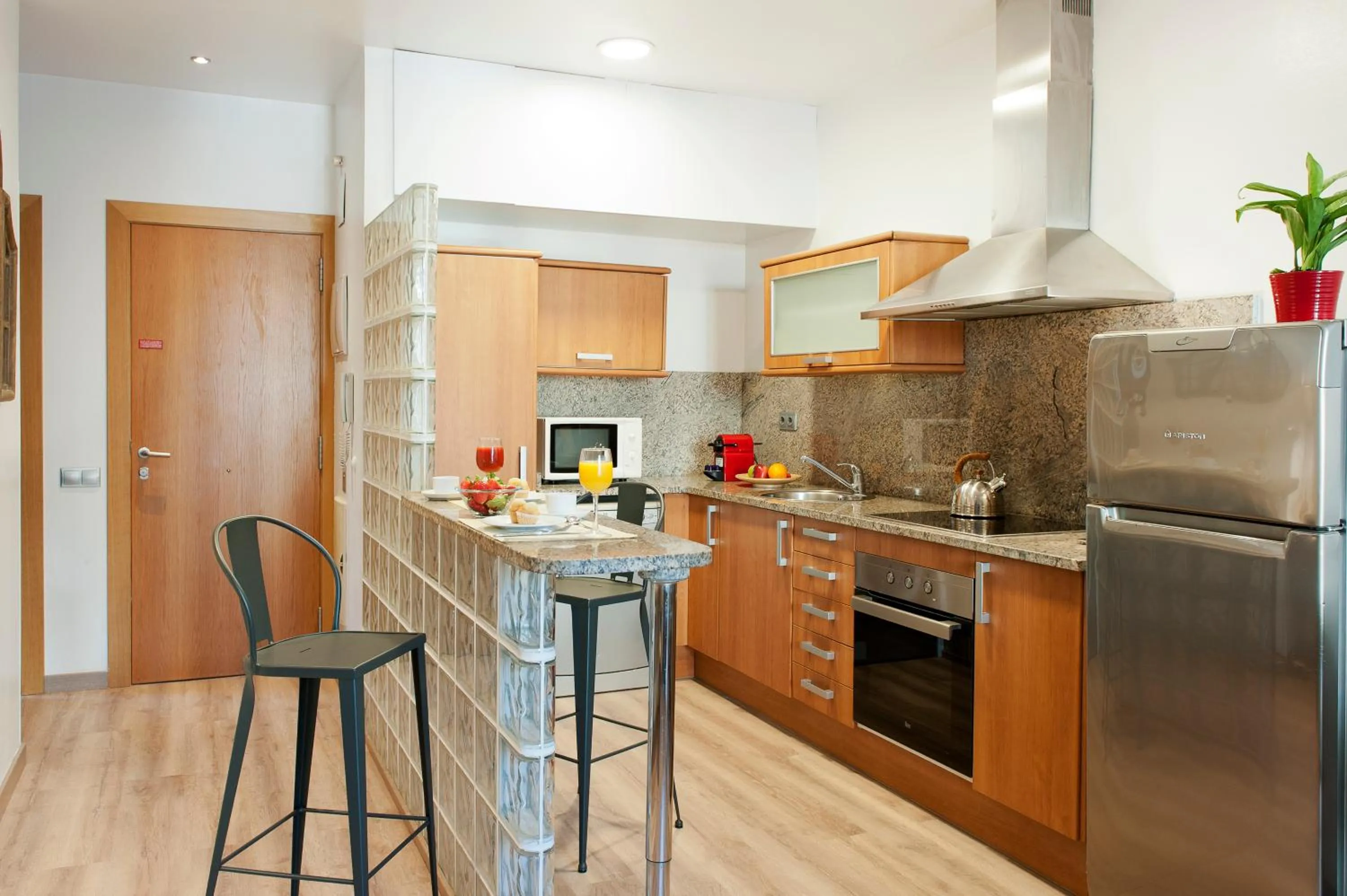 Kitchen or kitchenette in MH Apartments S. Familia