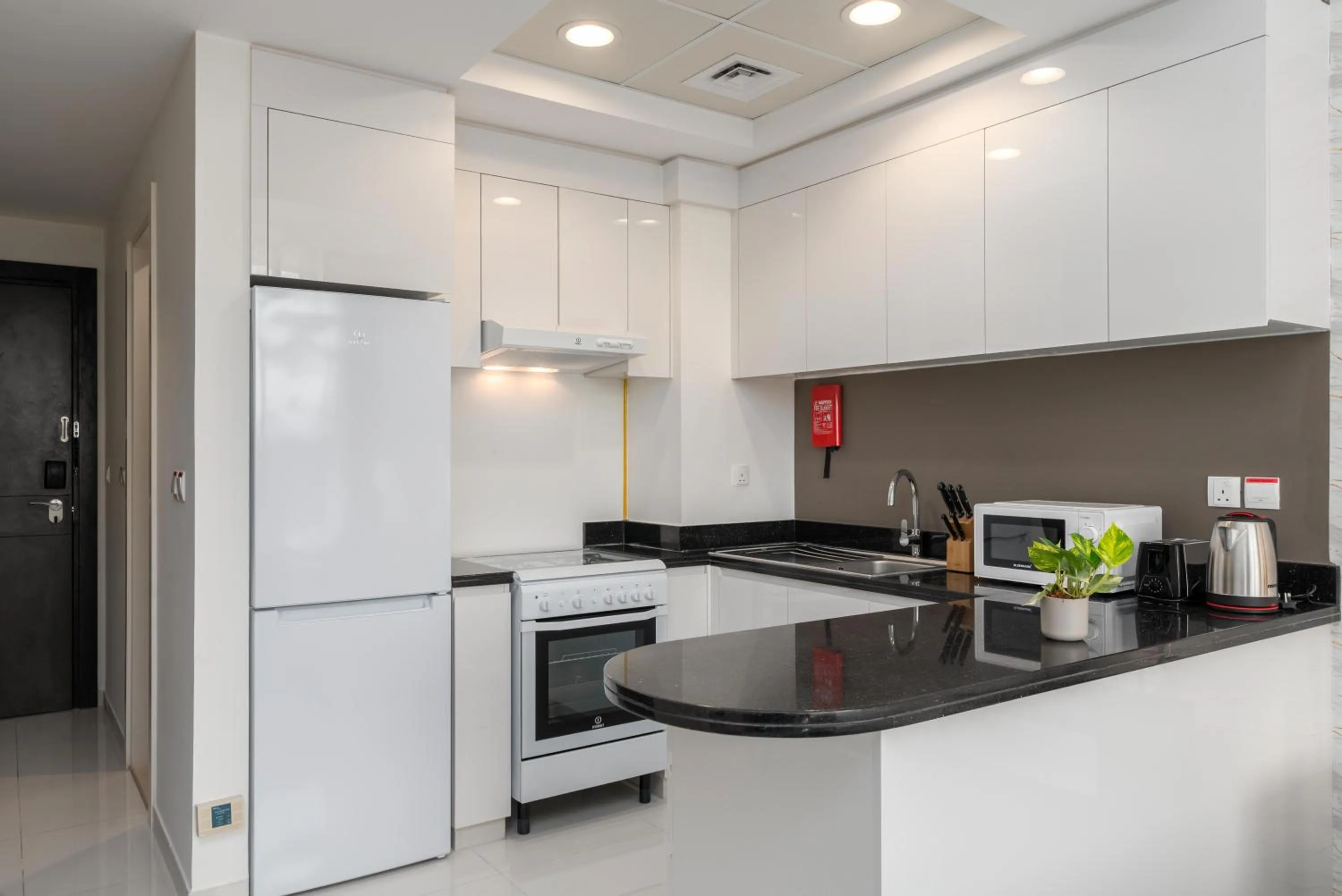 Kitchen or kitchenette in Vacay lettings - Upgraded studio at Damac tower JVC