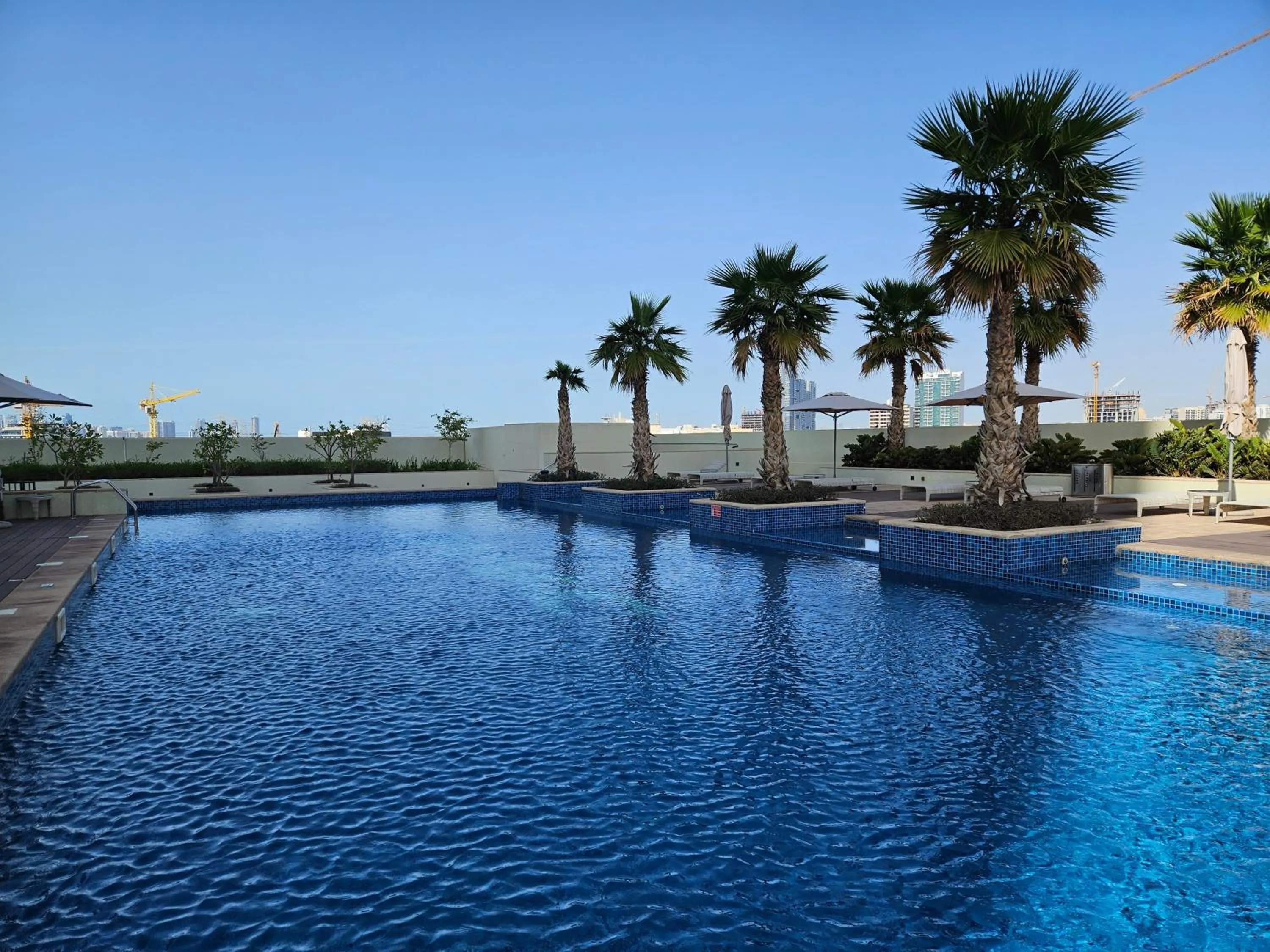 Pool view in Vacay lettings - Upgraded studio at Damac tower JVC