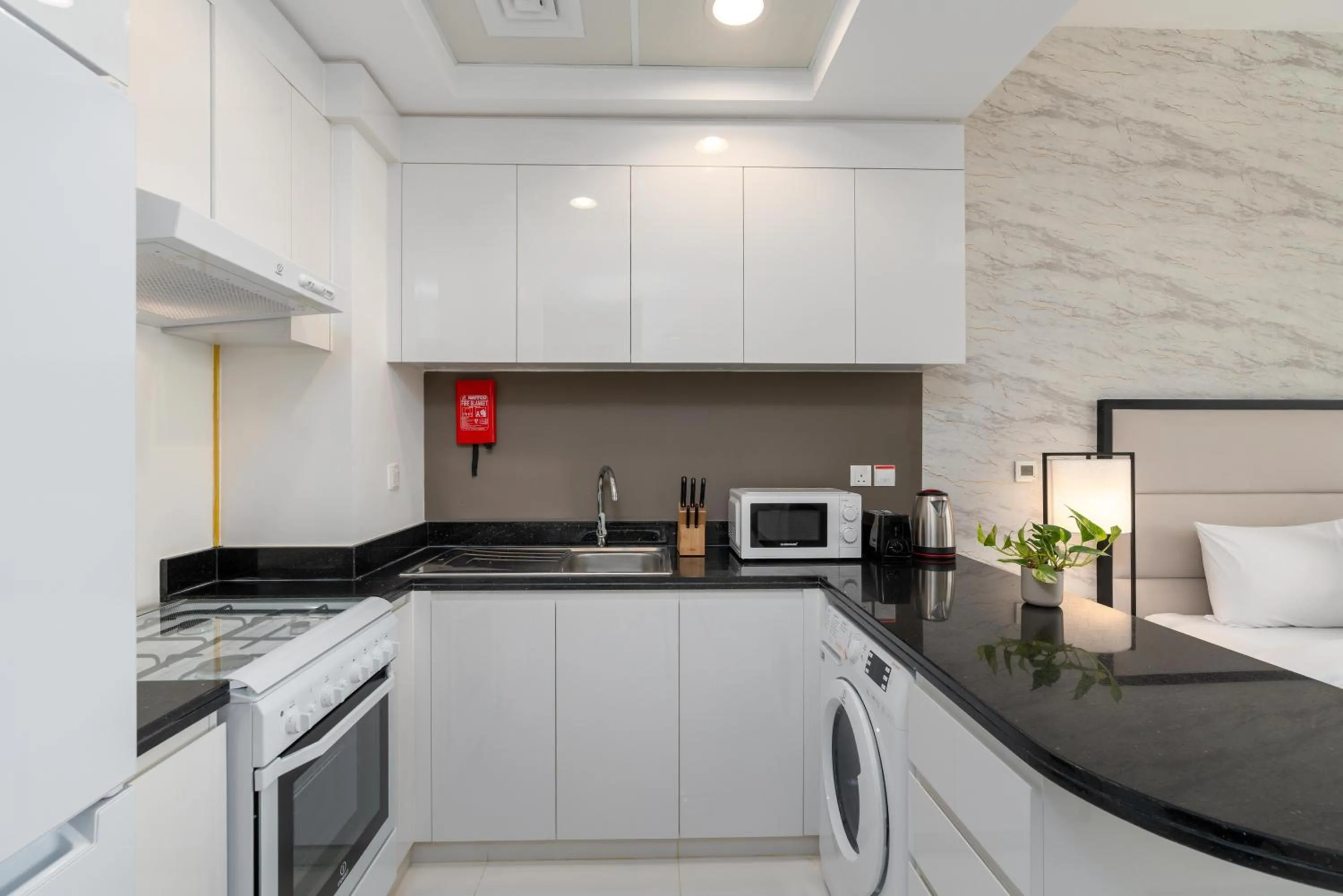 Kitchen or kitchenette in Vacay lettings - Upgraded studio at Damac tower JVC