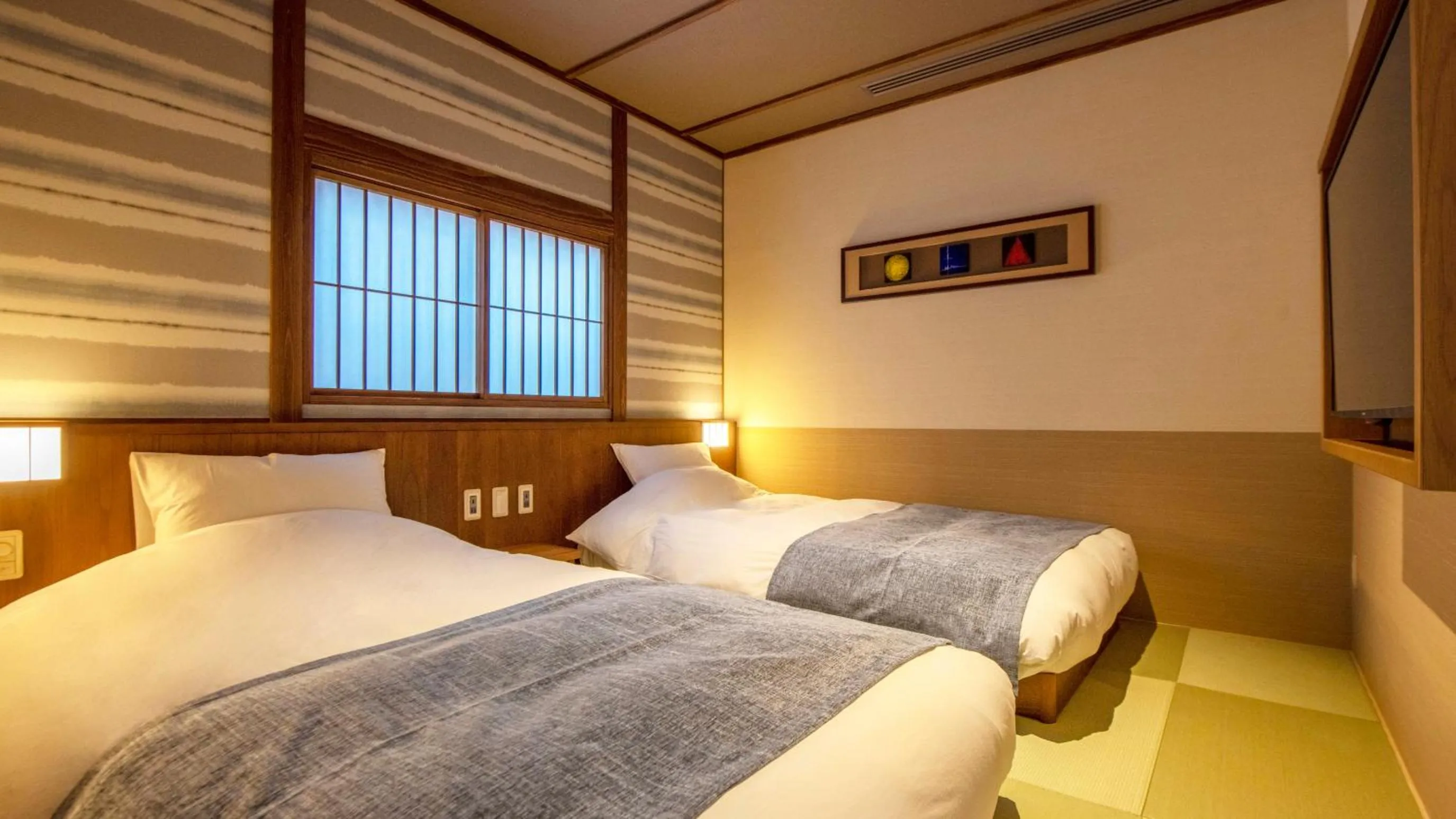 Bed in Shionoyu Onsen Rengetsu