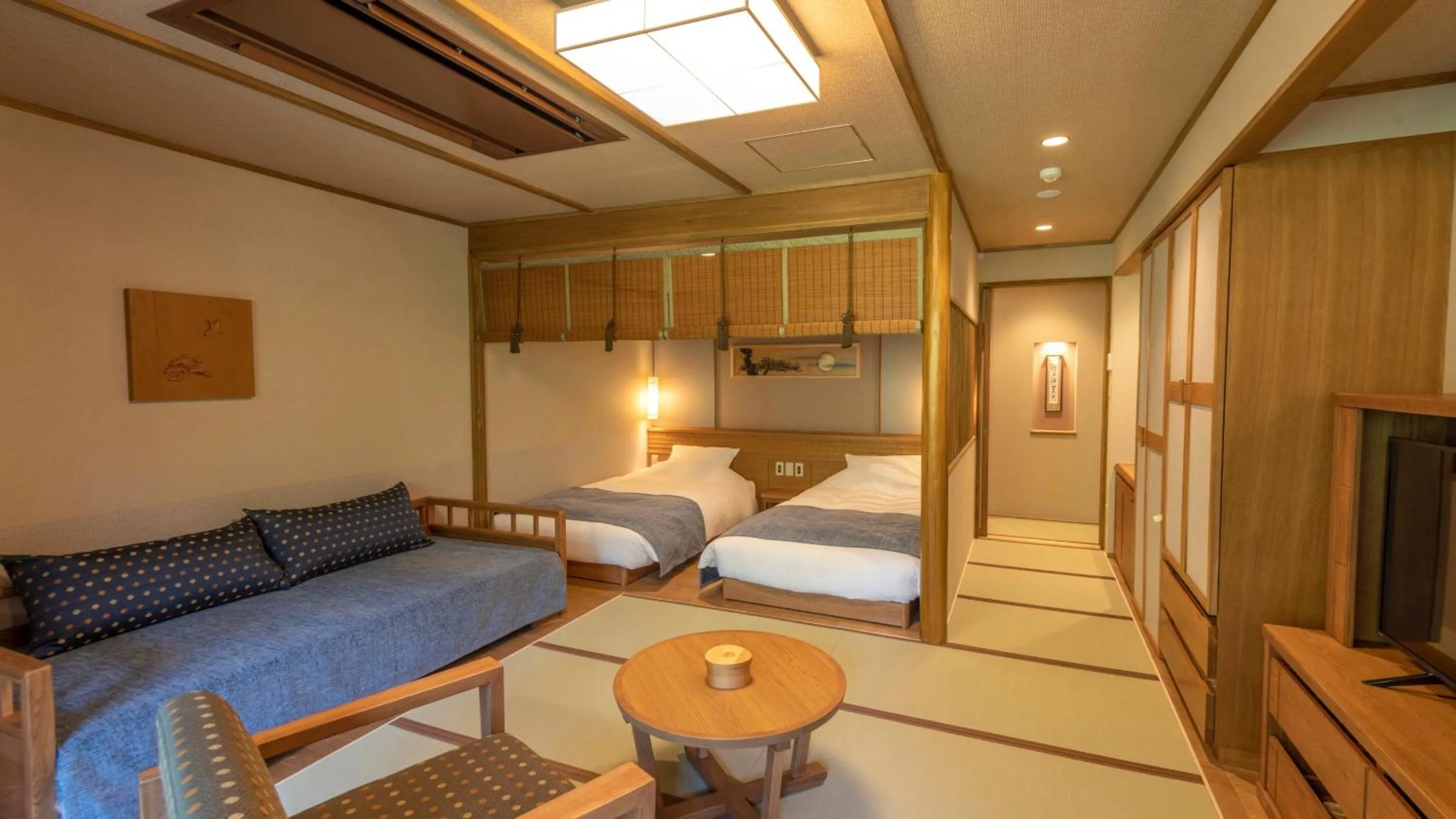 Bed in Shionoyu Onsen Rengetsu