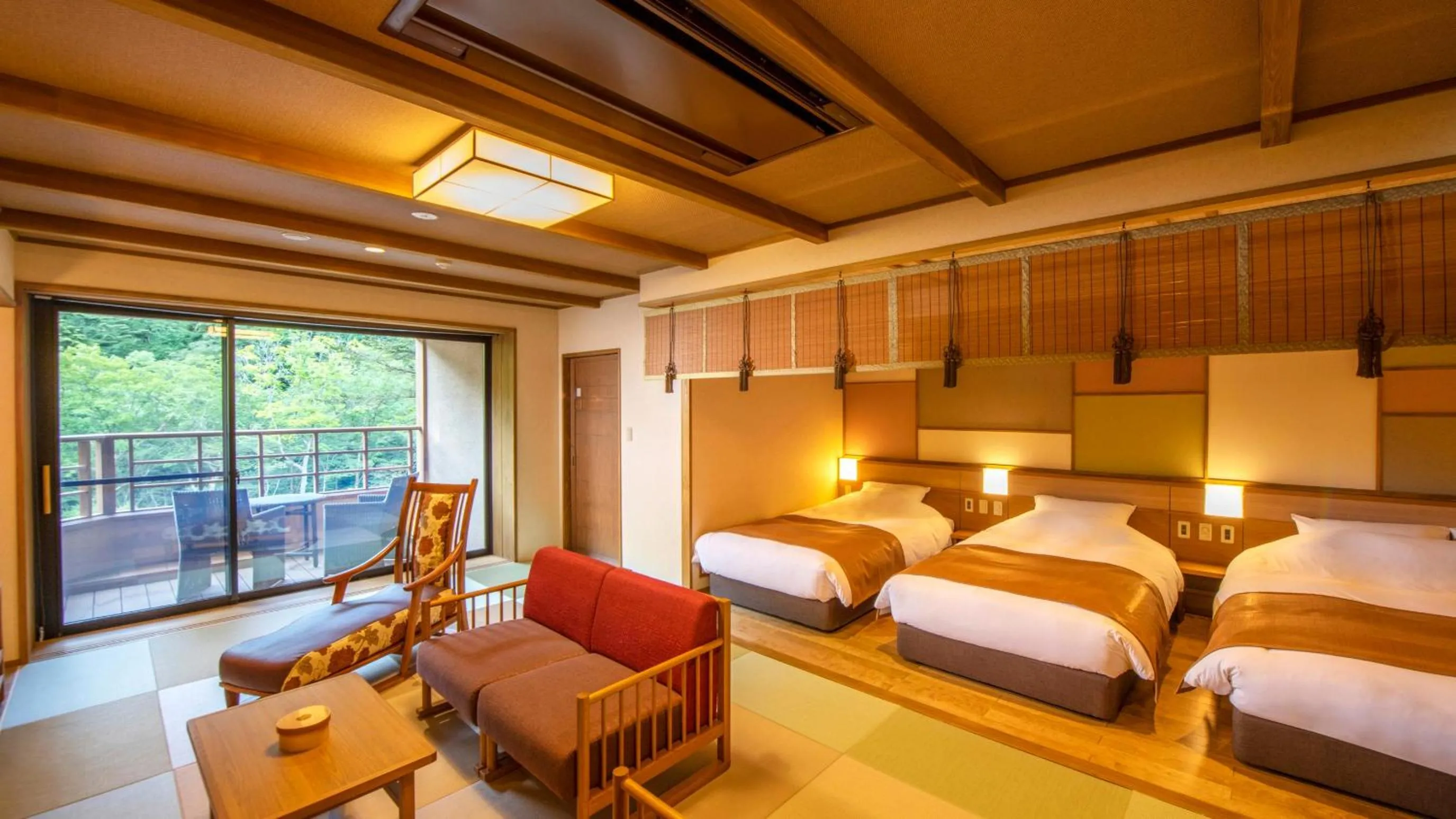 Living room, Bed in Shionoyu Onsen Rengetsu