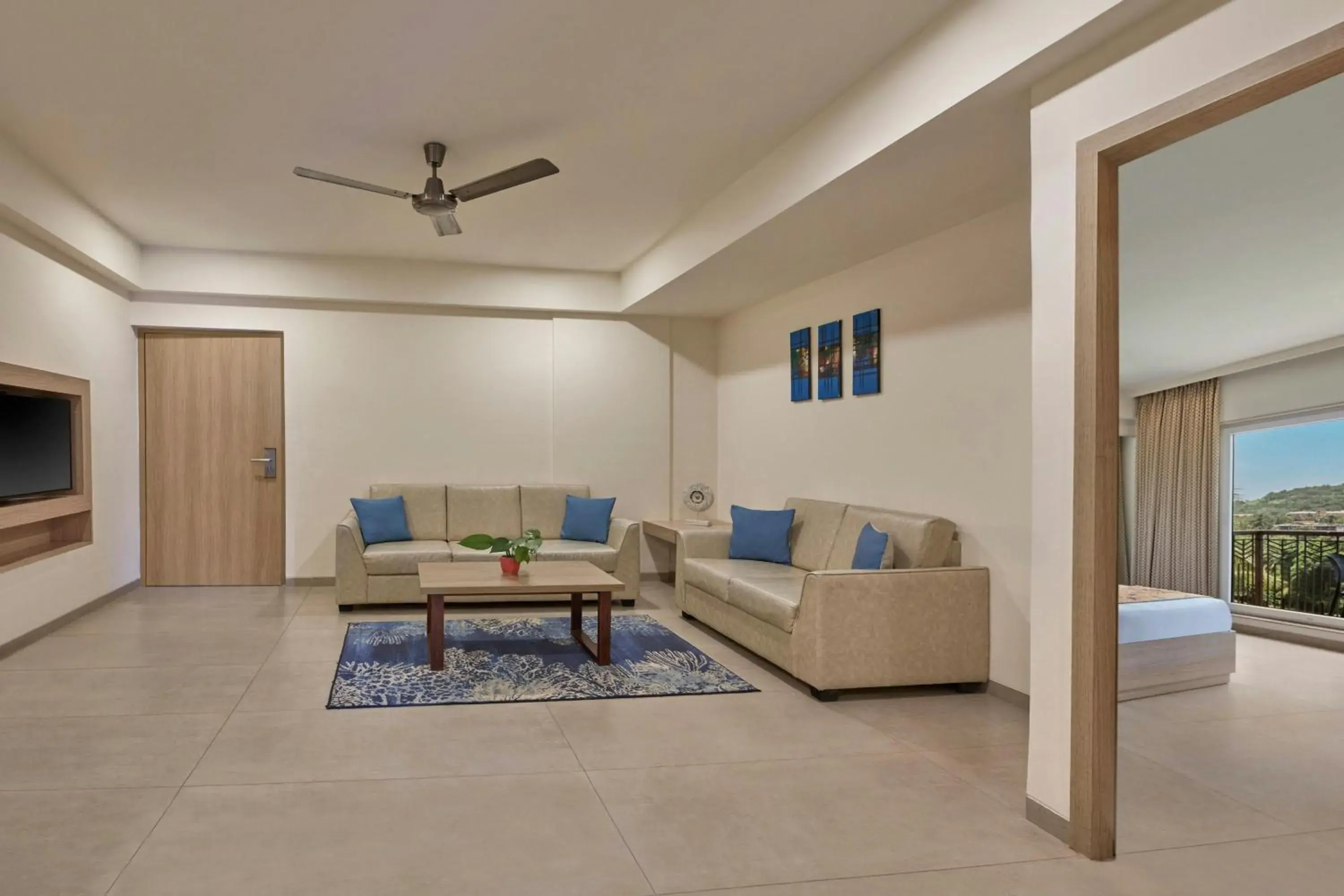 Living room in The Fern Habitat Goa, Candolim, Series by Marriott Living room in The Fern Habitat Goa, Candolim, Series by Marriott