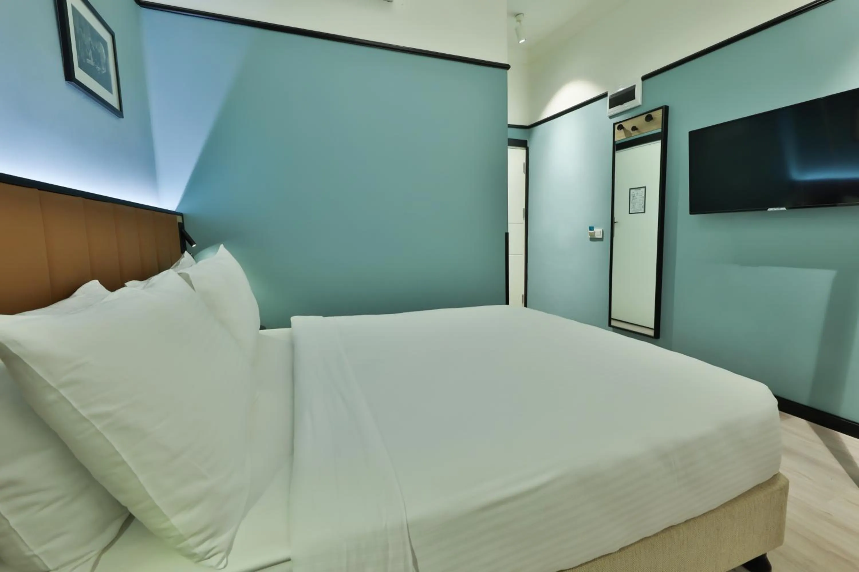 Bed in EA Exclusive Hotel