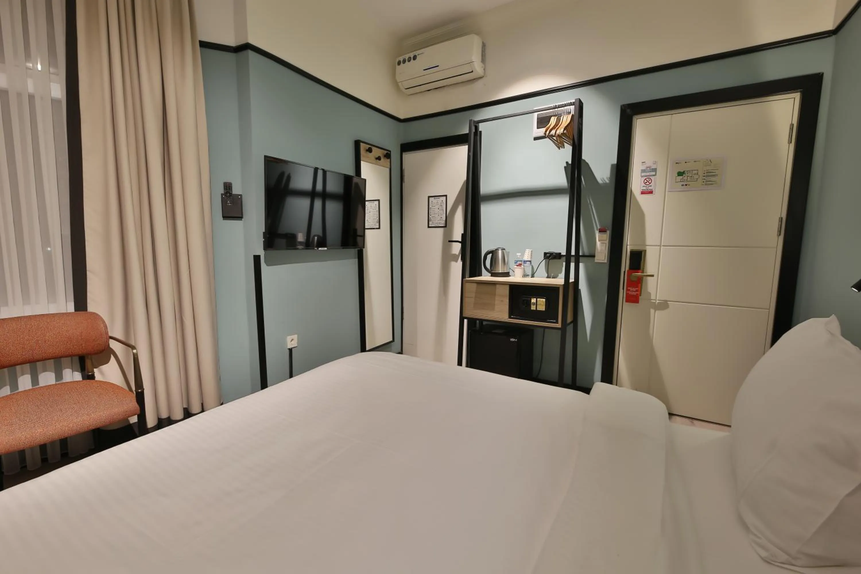 Bed in EA Exclusive Hotel