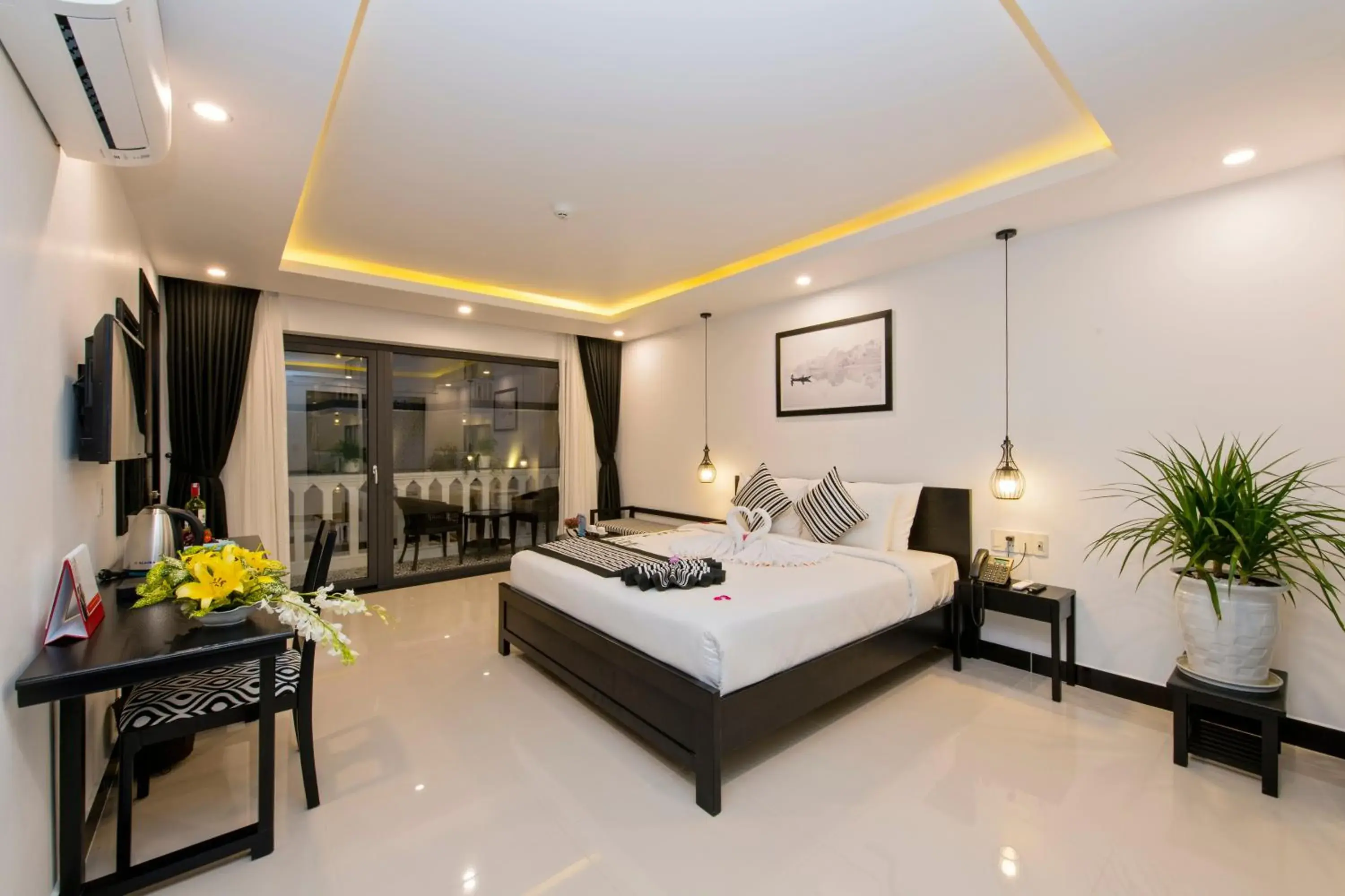 Photo of the whole room, Bed in Gem Riverside Hotel Hoi An Photo of the whole room, Bed in Gem Riverside Hotel Hoi An