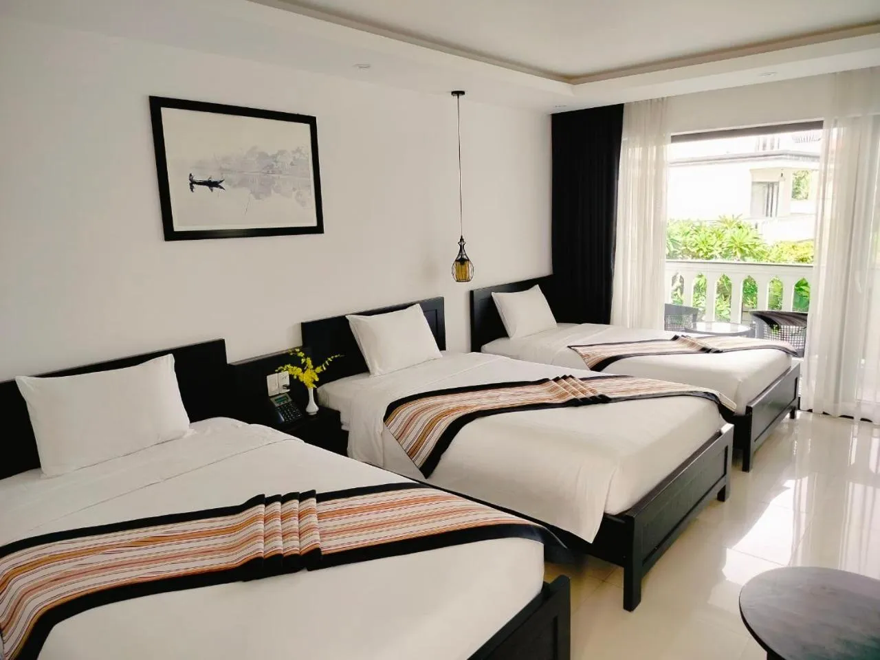 Bed in Gem Riverside Hotel Hoi An