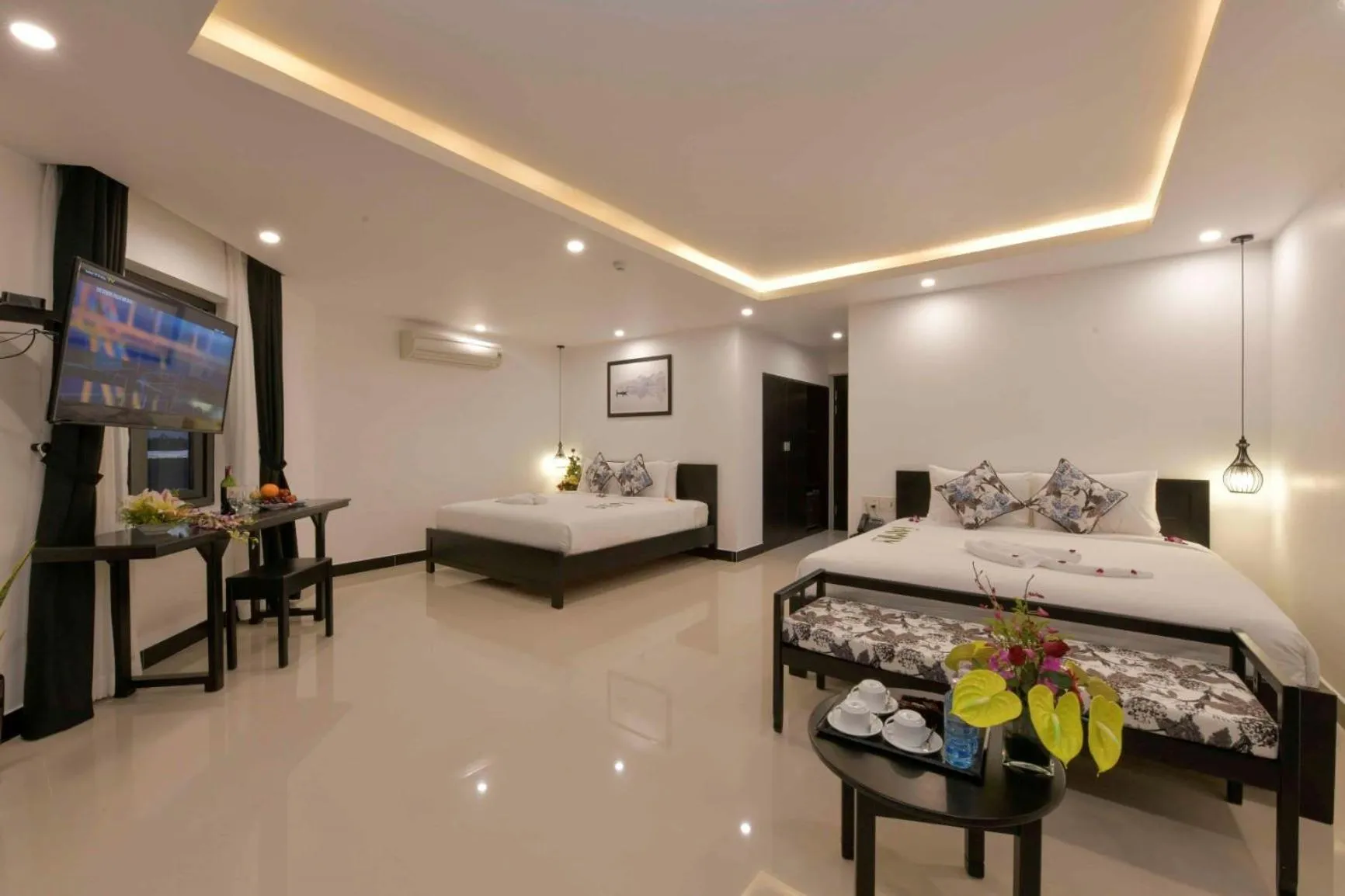 Living room, Bed in Gem Riverside Hotel Hoi An