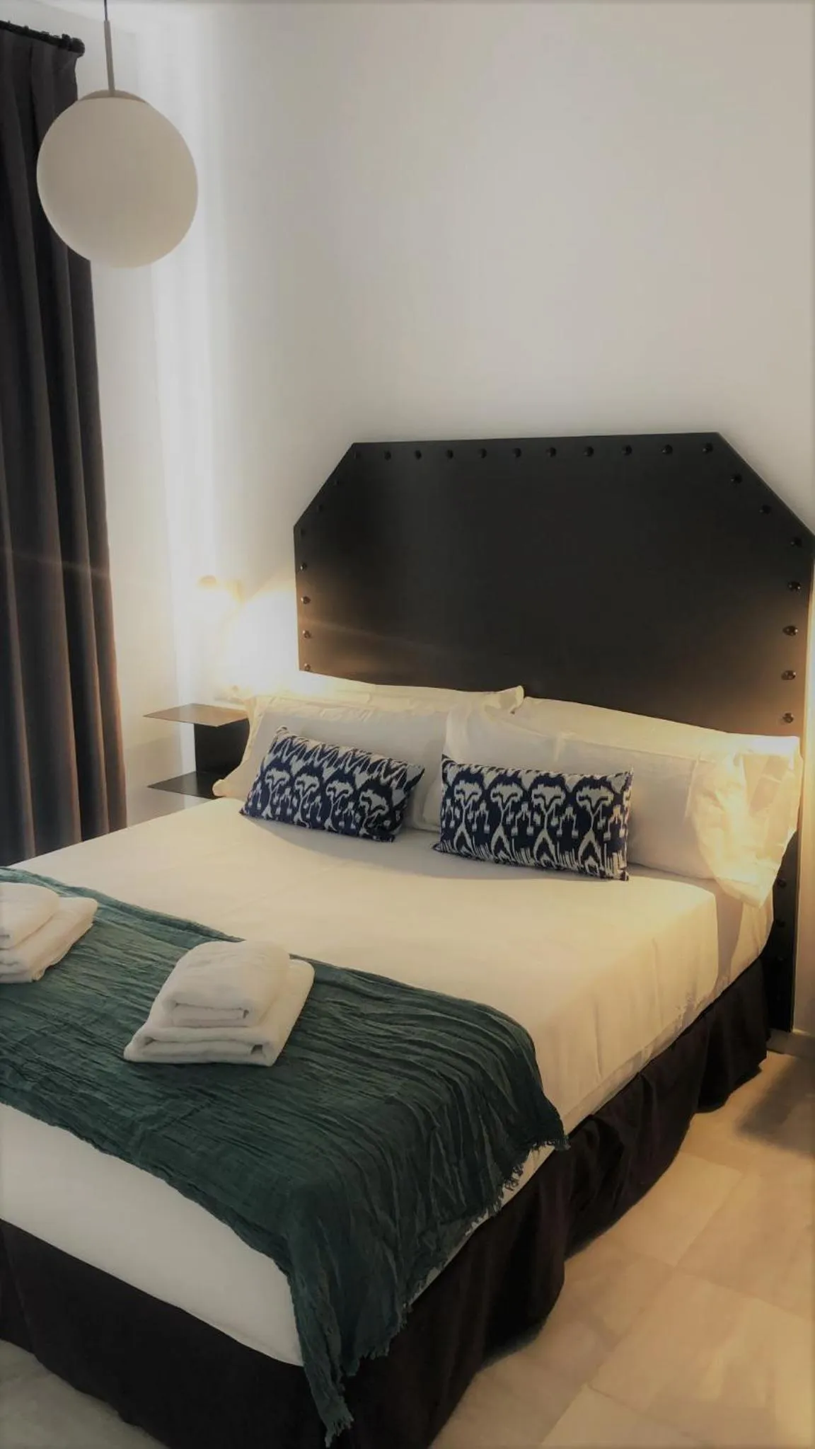 Bed in Hostal Hom Museo