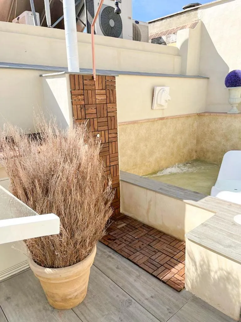 Swimming pool in Hostal Hom Museo