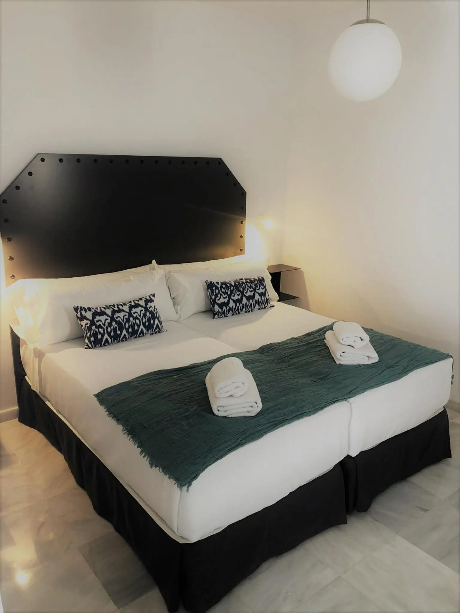 Bed in Hostal Hom Museo