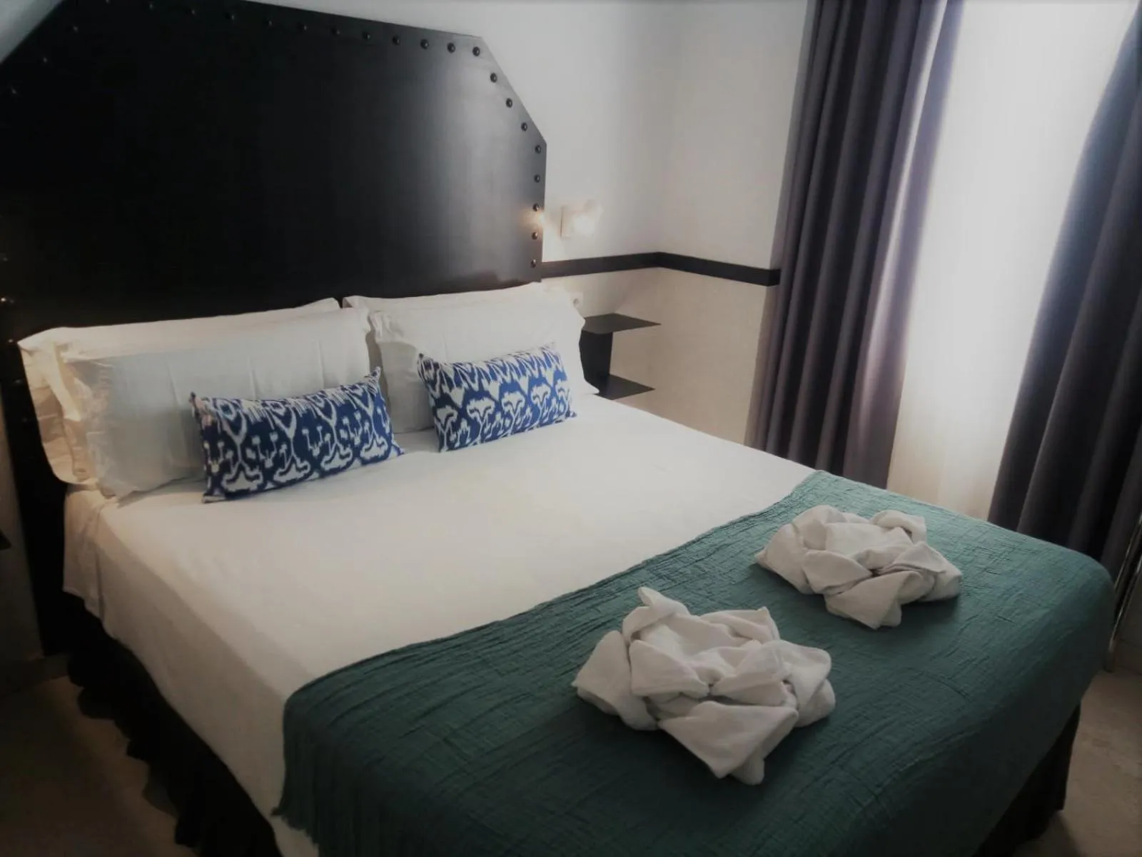 Bed in Hostal Hom Museo