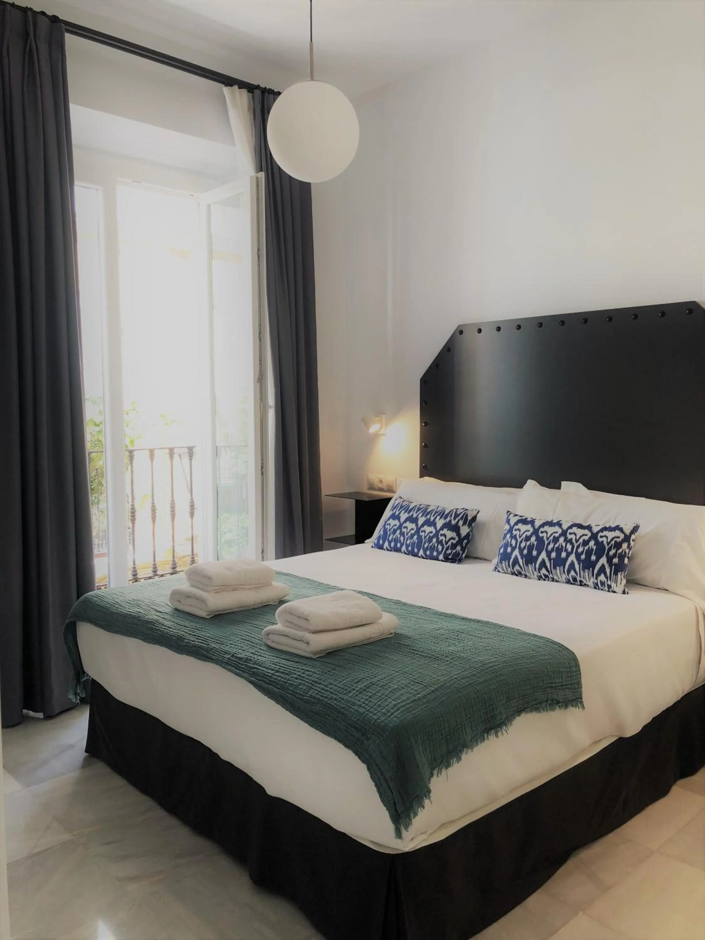 Photo of the whole room, Bed in Hostal Hom Museo