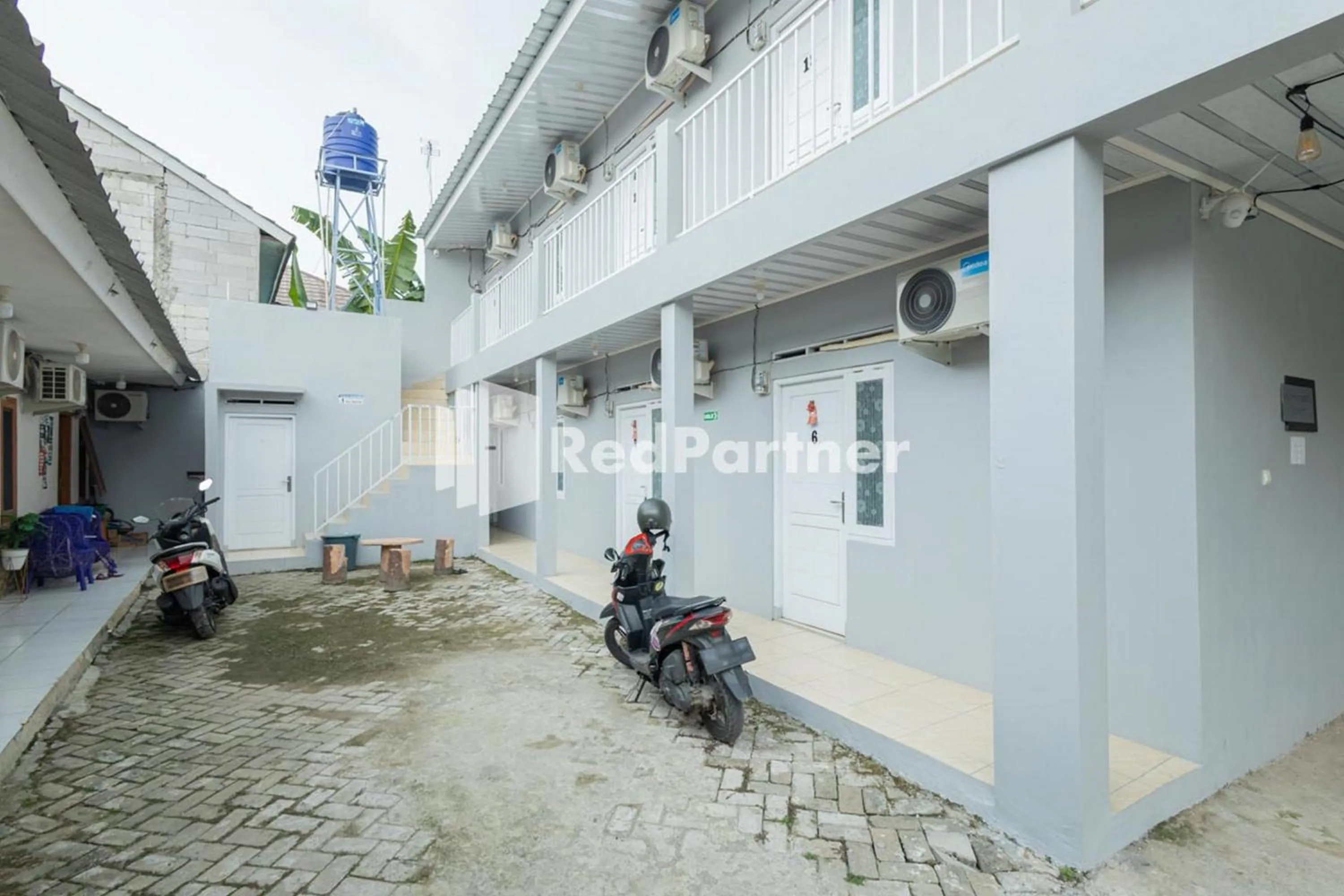 Property building in Atiq Homestay Syariah Mitra RedDoorz
