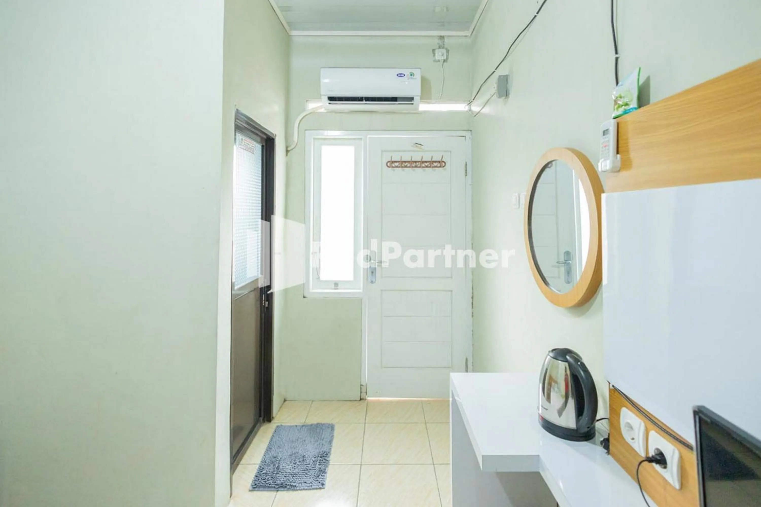 Bedroom in Atiq Homestay Syariah Mitra RedDoorz