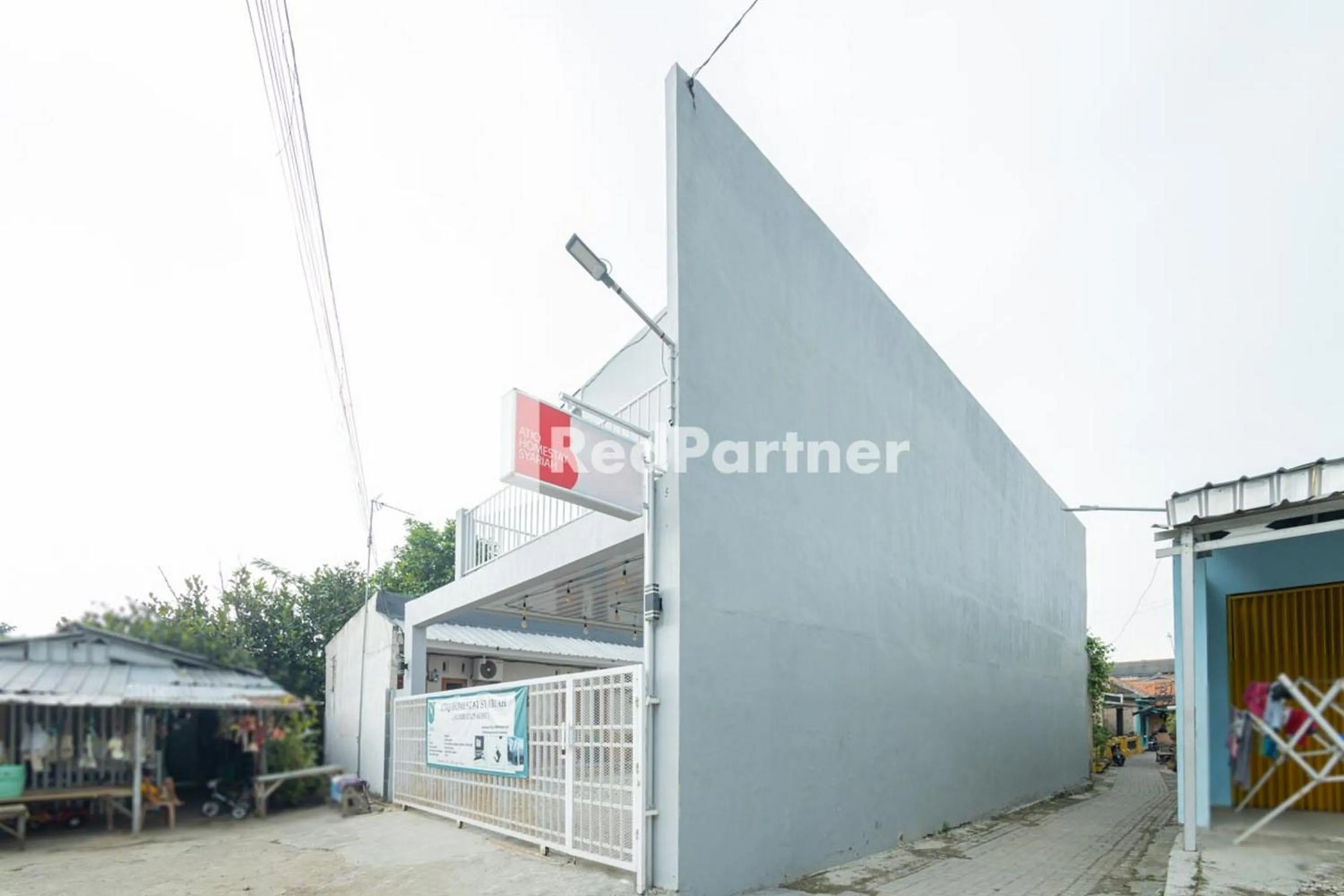 Property building in Atiq Homestay Syariah Mitra RedDoorz